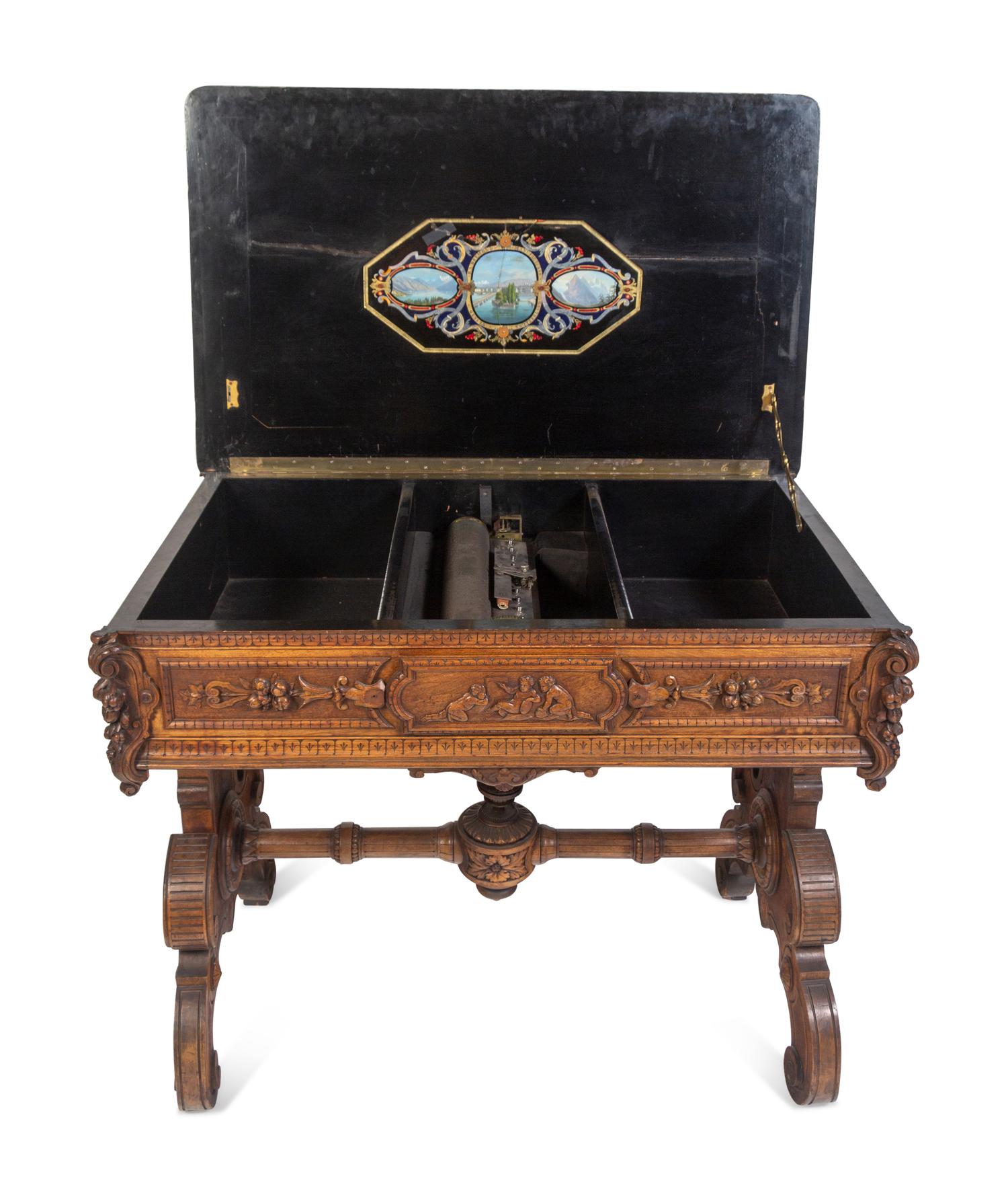 A Swiss Cylinder Music Box in a Carved Walnut Case and Stand