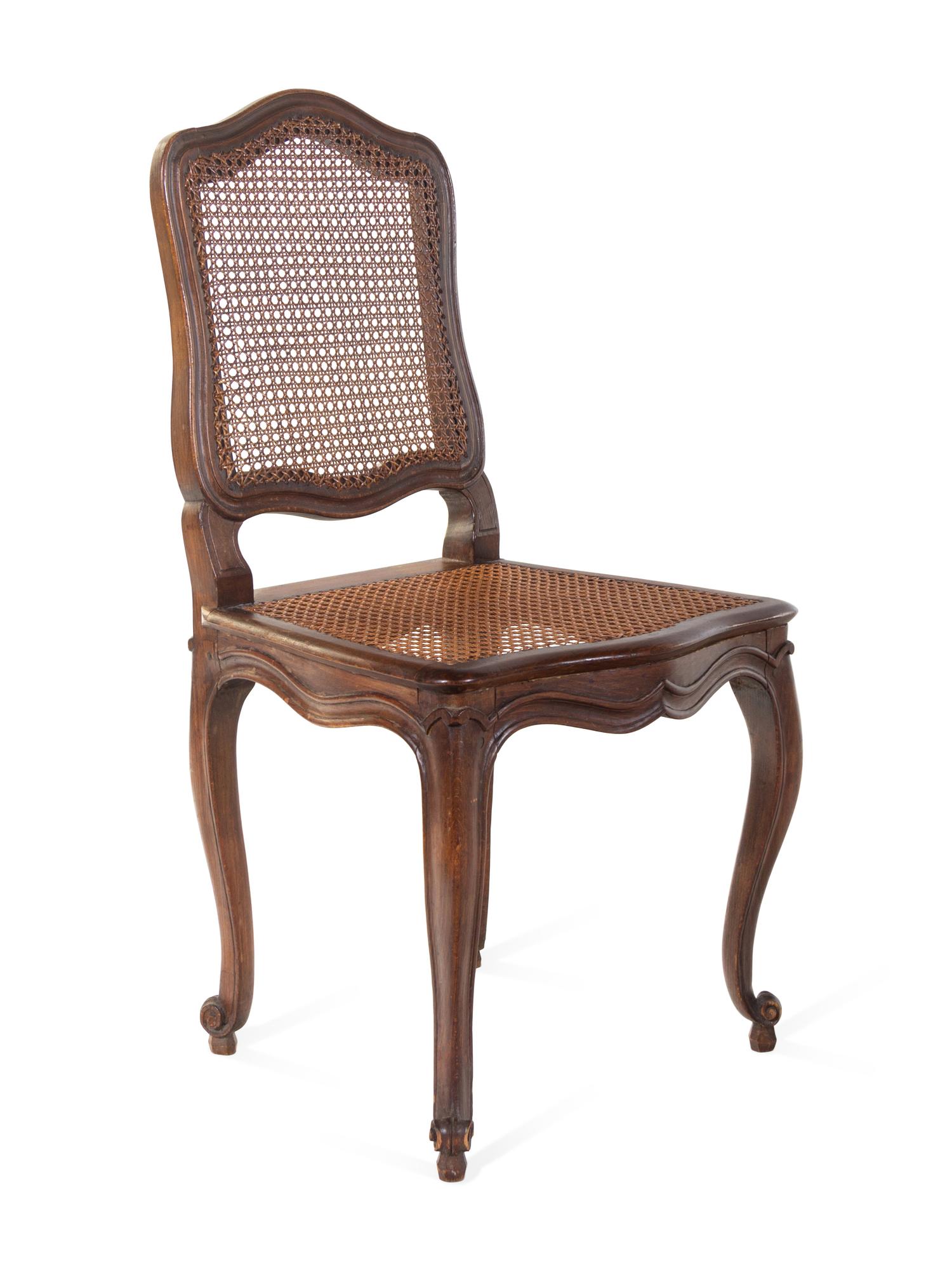 A Group of Four Louis XV Walnut Chairs
