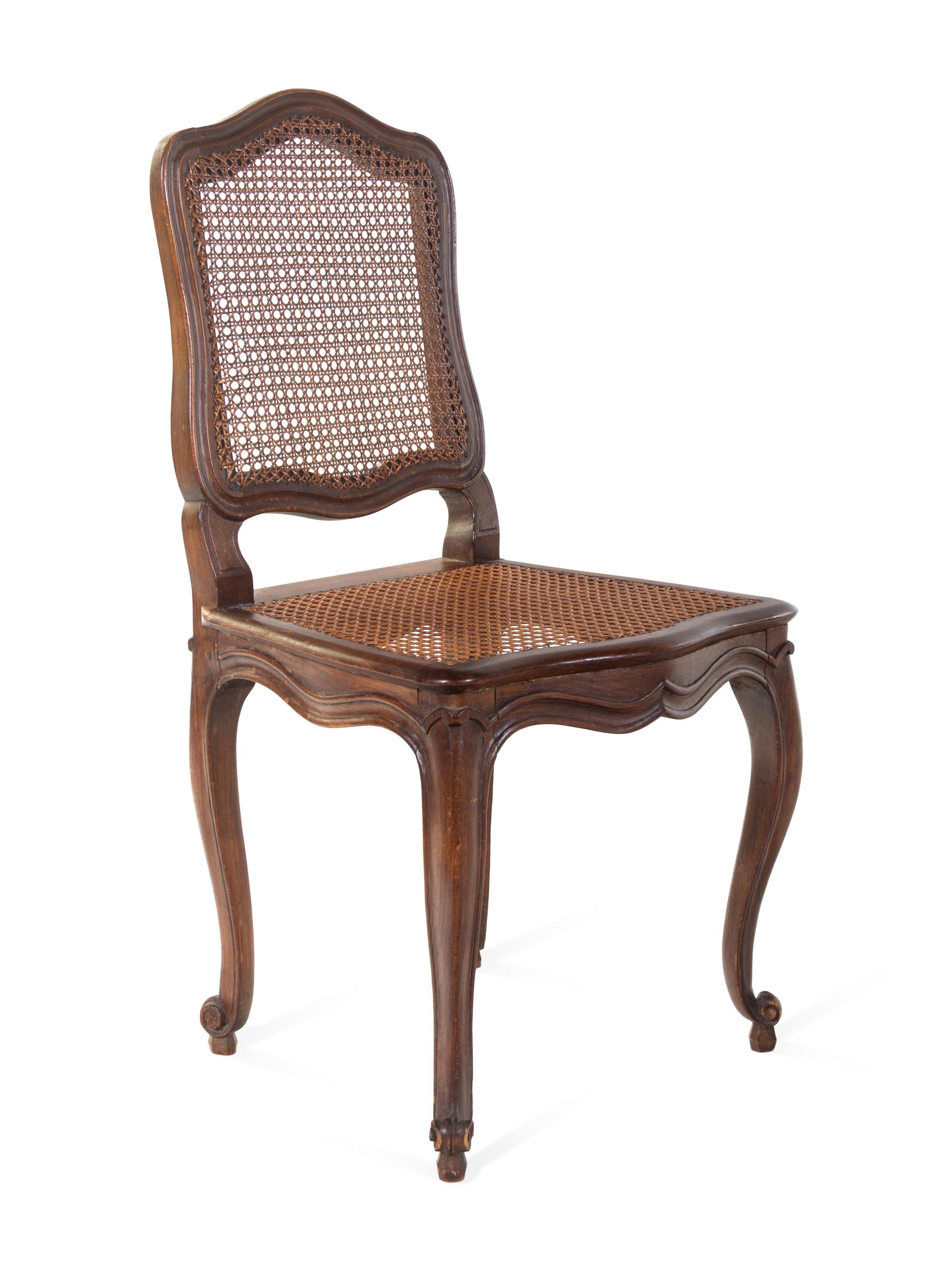 A Group of Four Louis XV Walnut Chairs
