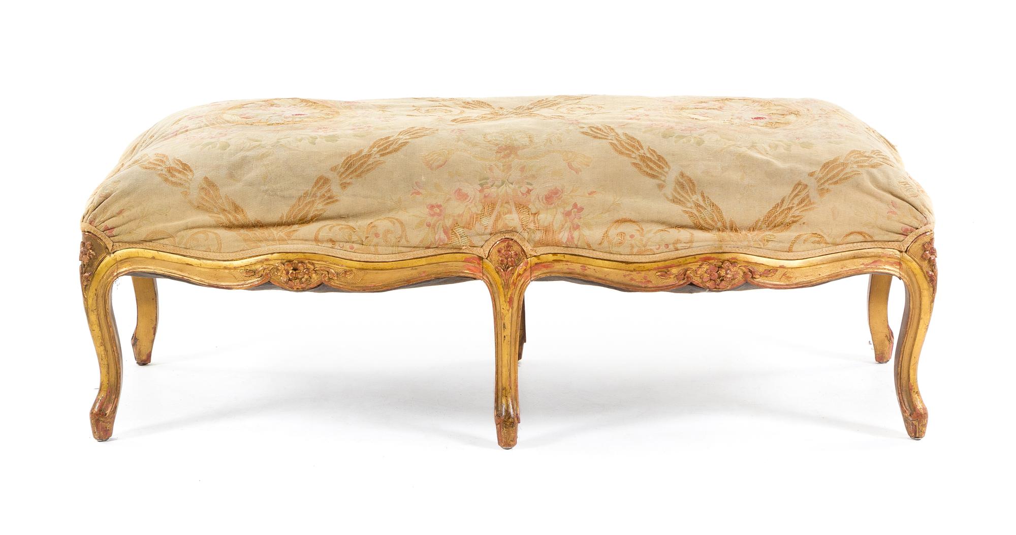 A Louis XV Style Giltwood Bench Height 17 1/2 x width 48 x depth 22 1/2 inches. — 19TH CENTURY