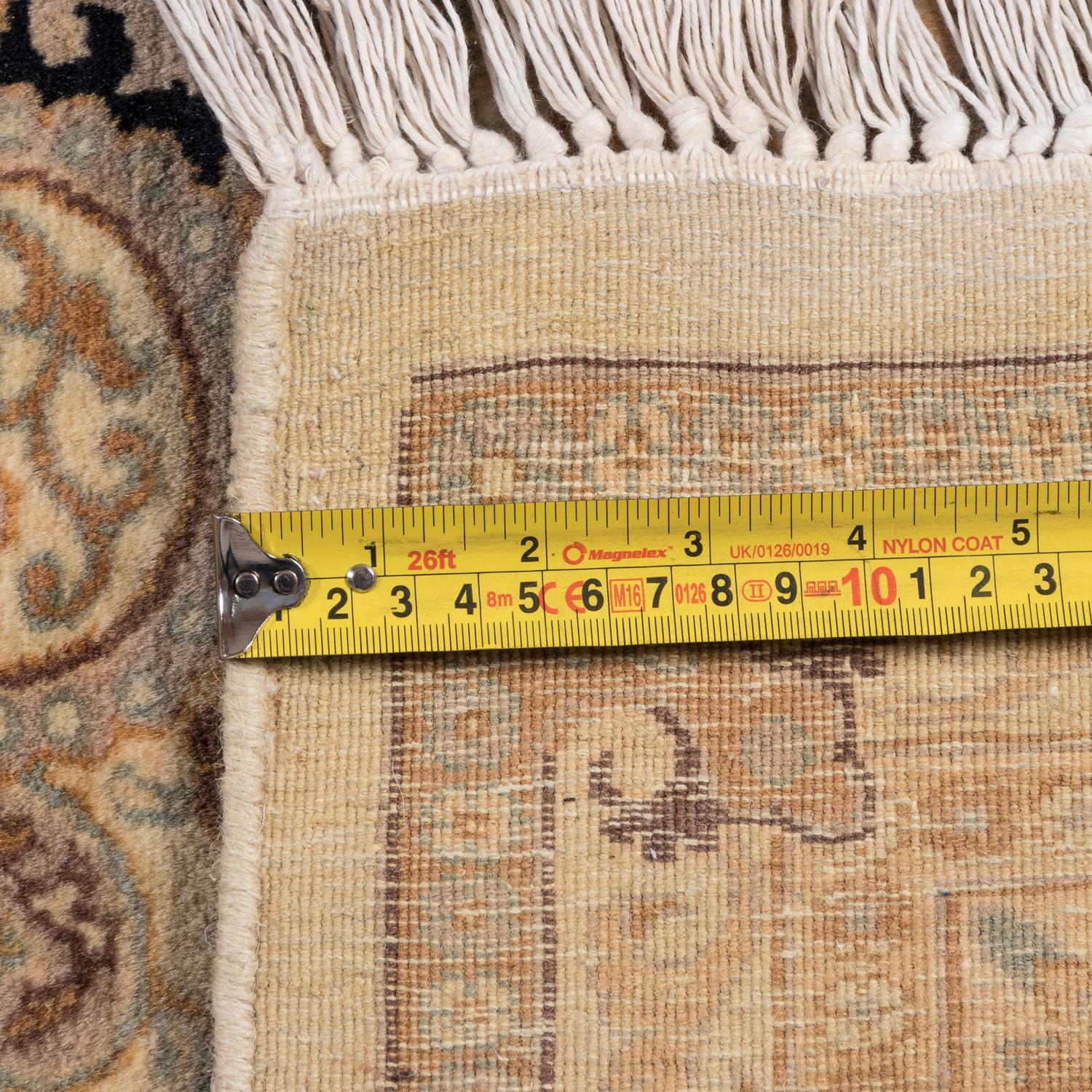 An Indian Wool and Silk Rug
