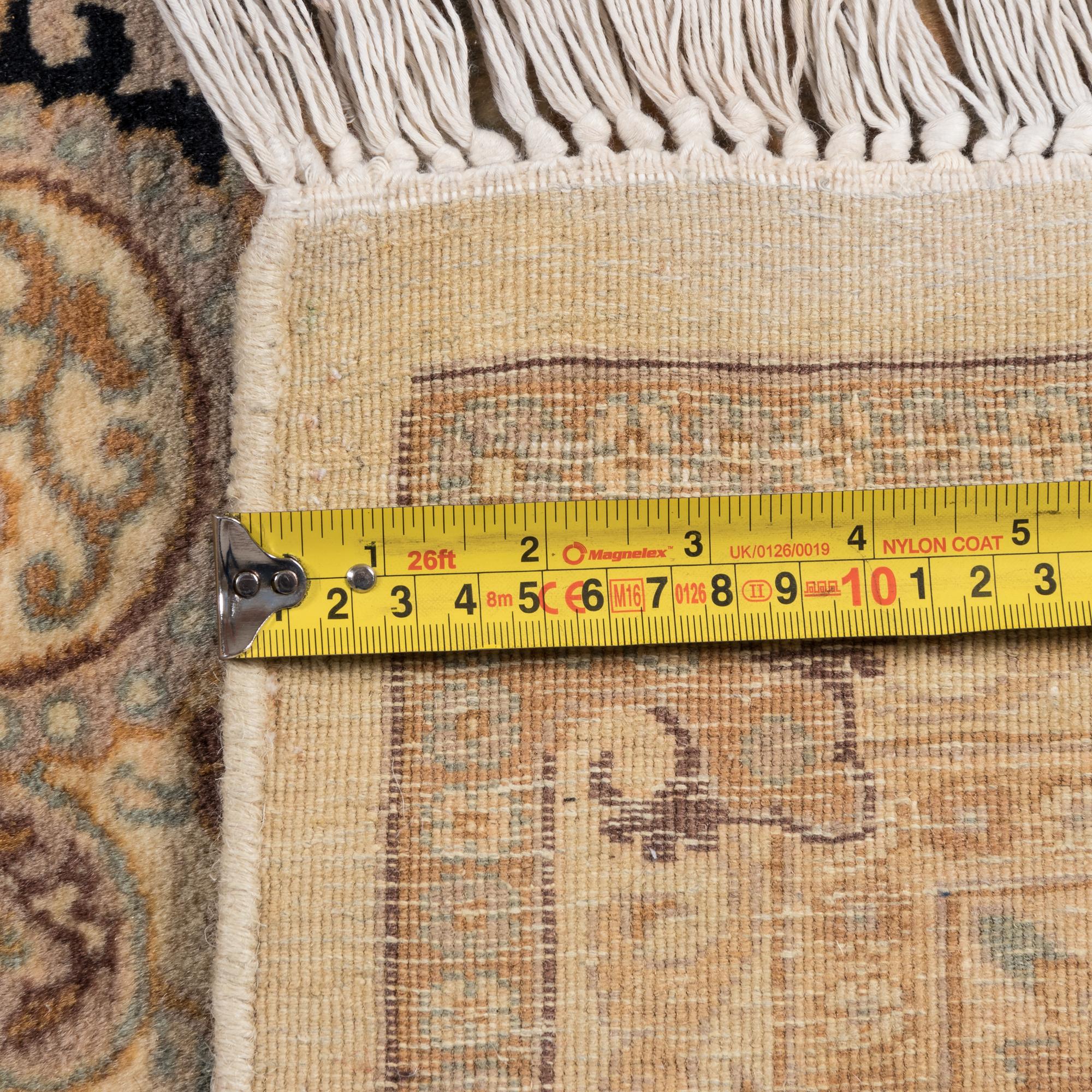 An Indian Wool and Silk Rug