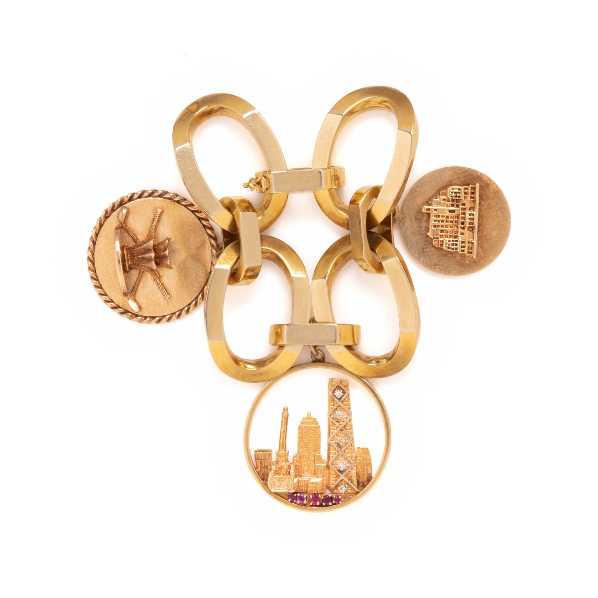 YELLOW GOLD CHARM BRACELET