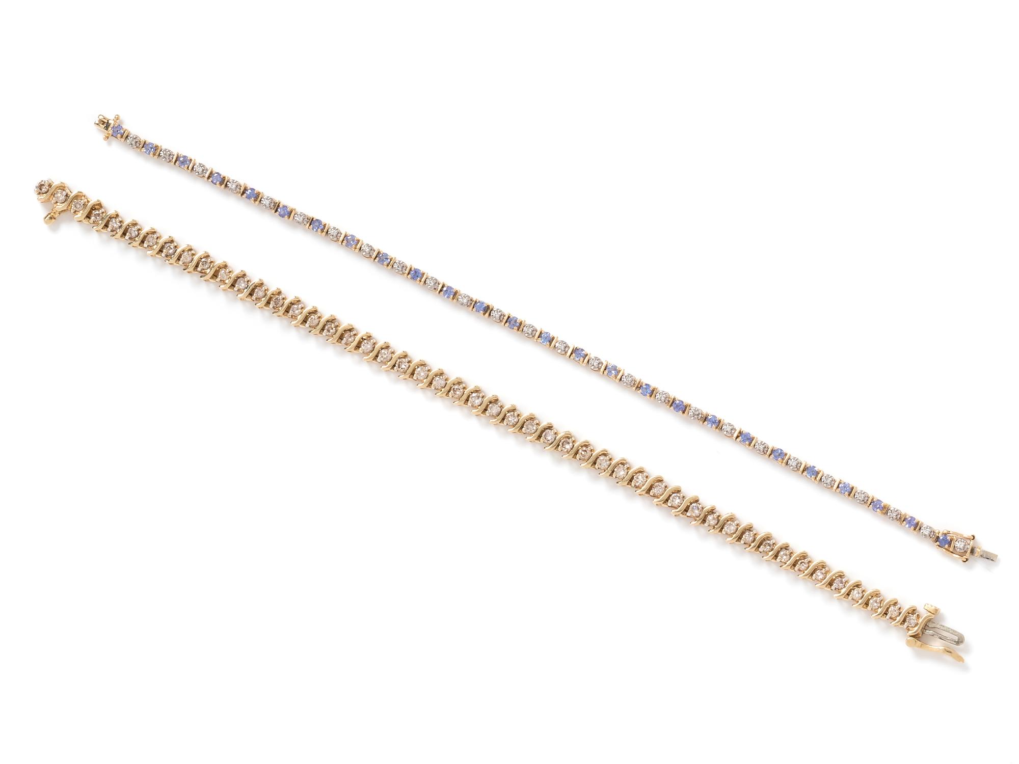 A Collection of 14 Karat Yellow Gold and Diamond Bracelets,