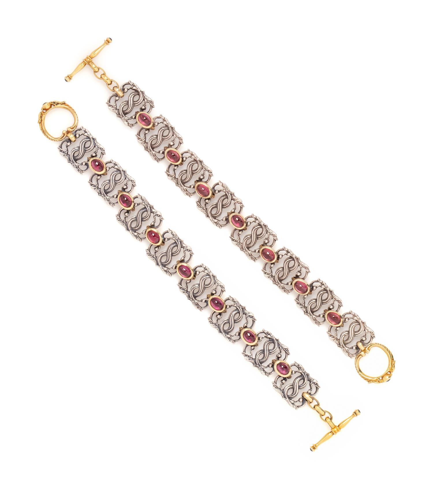 PAUL LANTUCH, PAIR OF STERLING SILVER, YELLOW GOLD AND GARNET BRACELETS