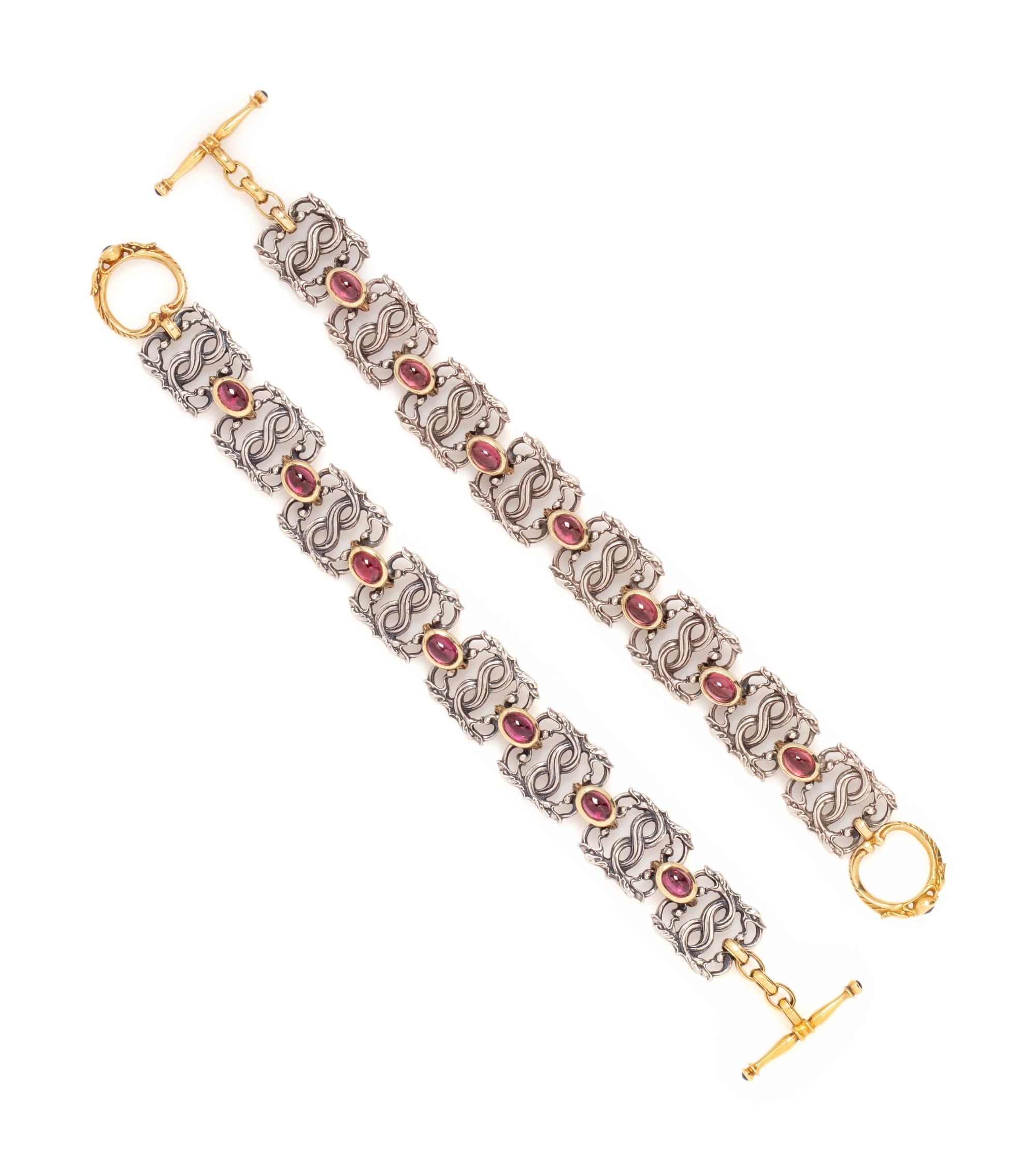 PAUL LANTUCH, PAIR OF STERLING SILVER, YELLOW GOLD AND GARNET BRACELETS