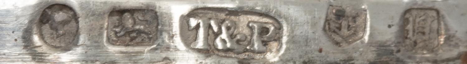 A Victorian Silver Nutmeg Grater, John Taylor & John Perry, Birmingham, 1844, of nutmeg form, the case engraved with S-scrolls, the hin