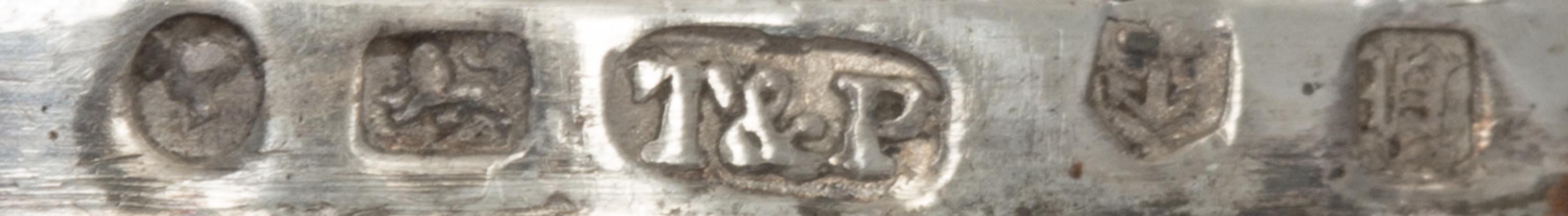 A Victorian Silver Nutmeg Grater, John Taylor & John Perry, Birmingham, 1844, of nutmeg form, the case engraved with S-scrolls, the hin