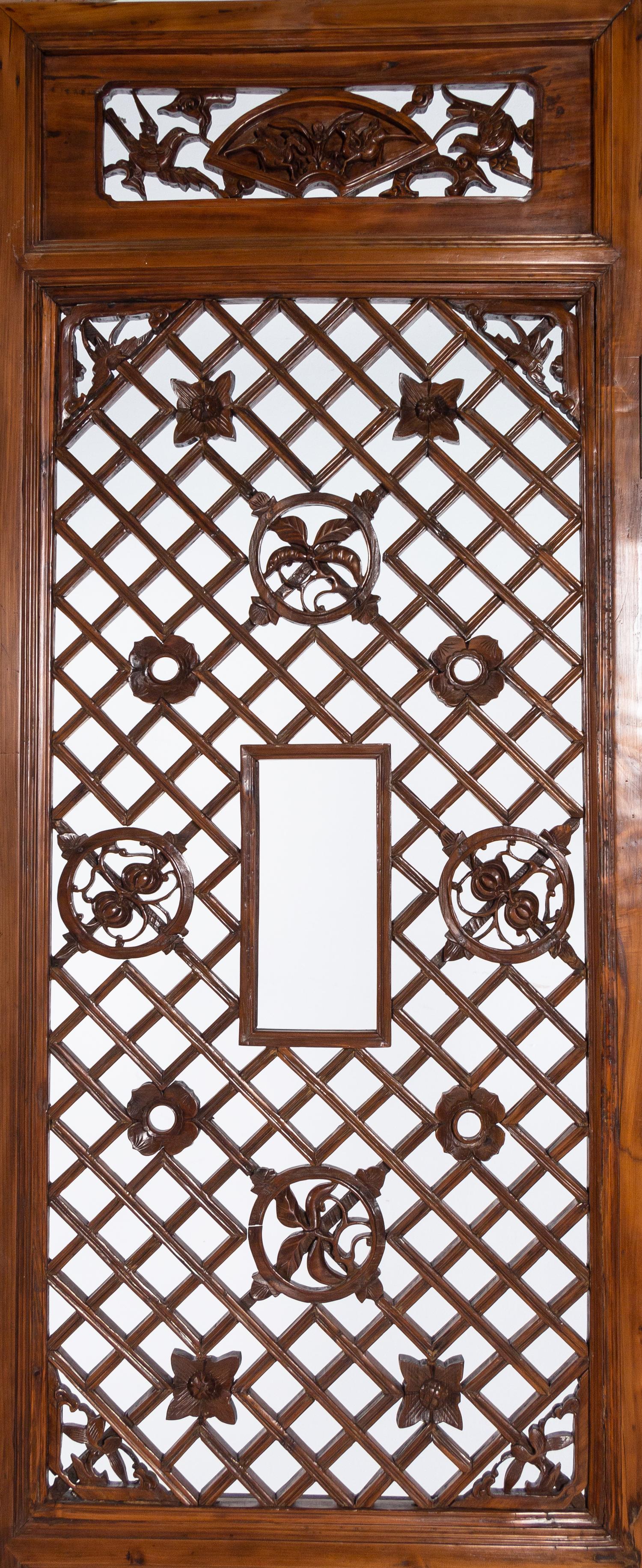 A Set of Four Chinese Softwood Door Panels