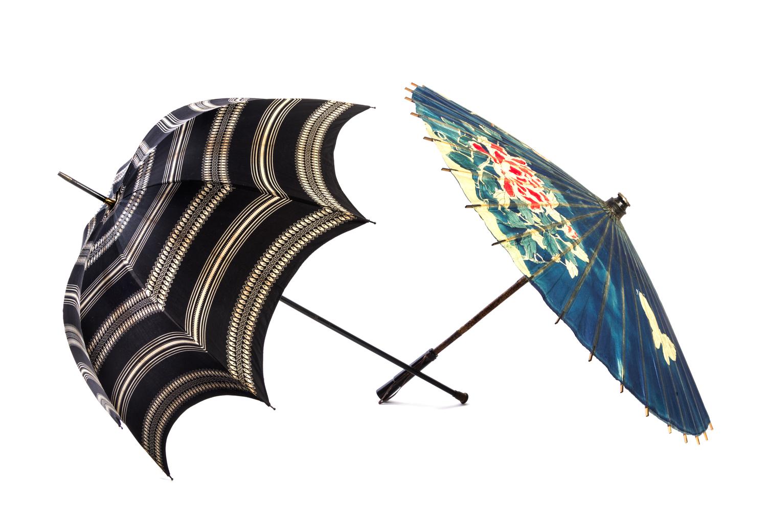 A Collection of Twenty Victorian Umbrellas and Parasols Length of longest 41 1/2 inches.