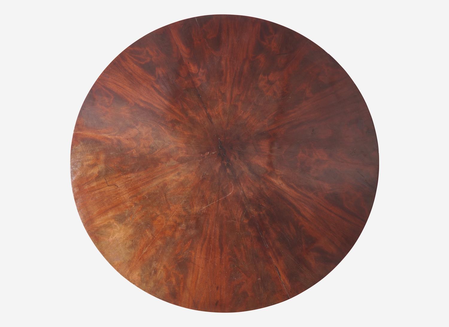 A Regency Parcel Gilt and Figured Mahogany Breakfast Table