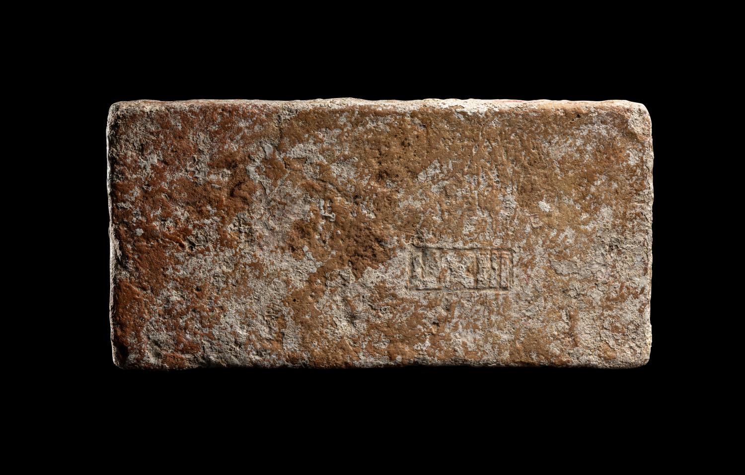 A Roman Ceramic Brick Stamped LXIII