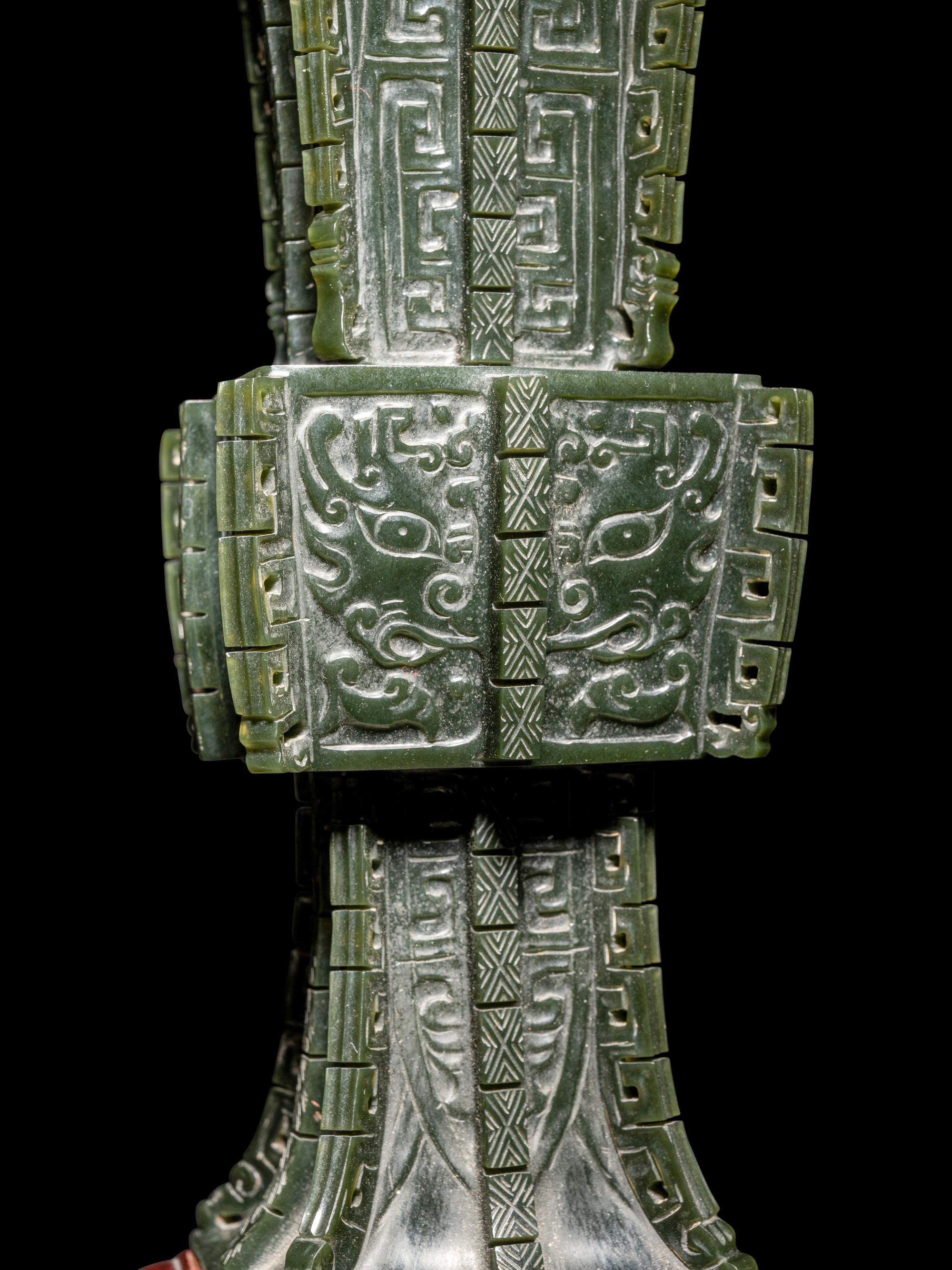 A Pair of Spinach Jade 'Taotie' Gu Vases