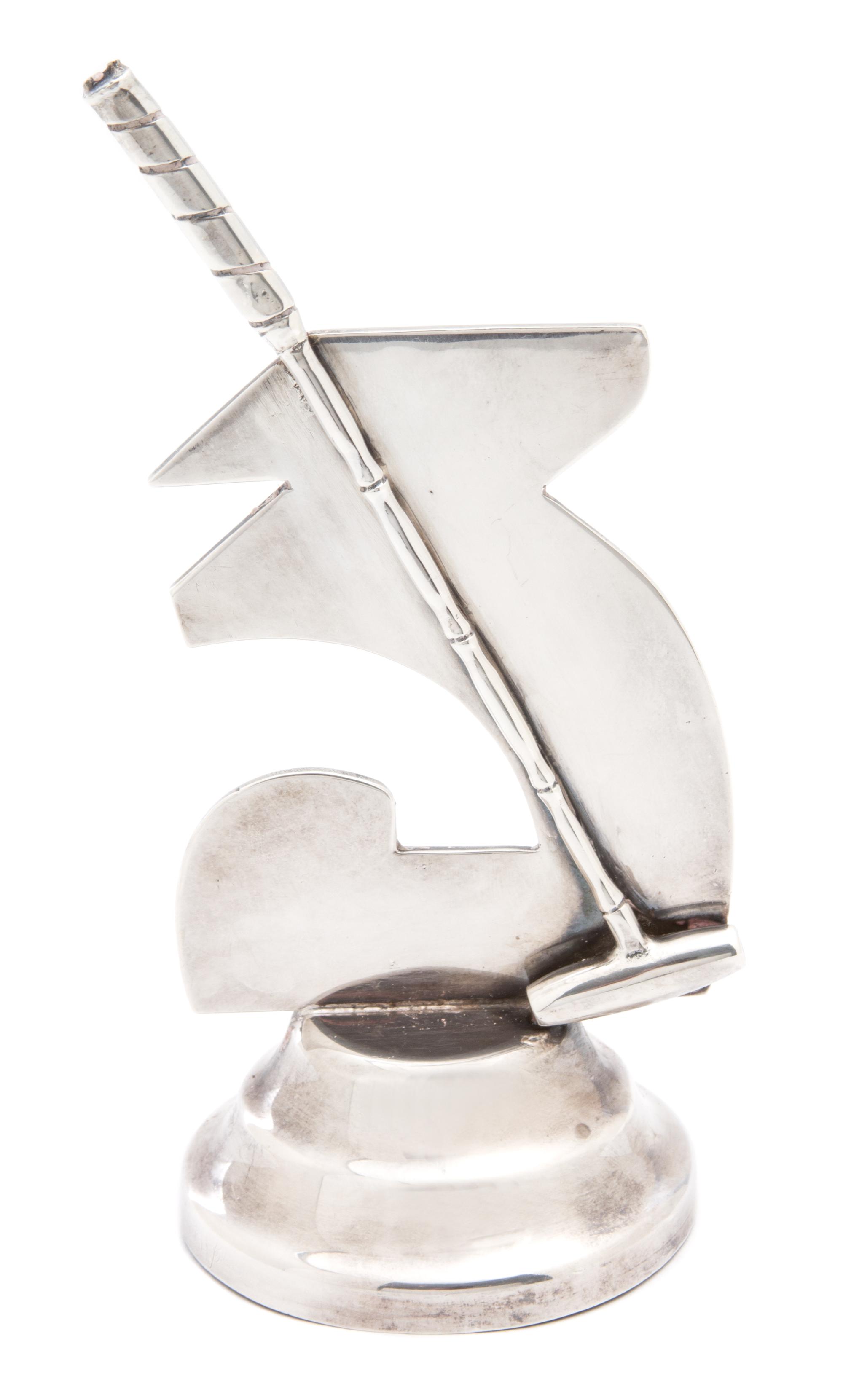 A Colombian Silver Polo Prize Ornament, (20th Century), modeled as a stylized 3 with a polo mallet on a circular stepped base