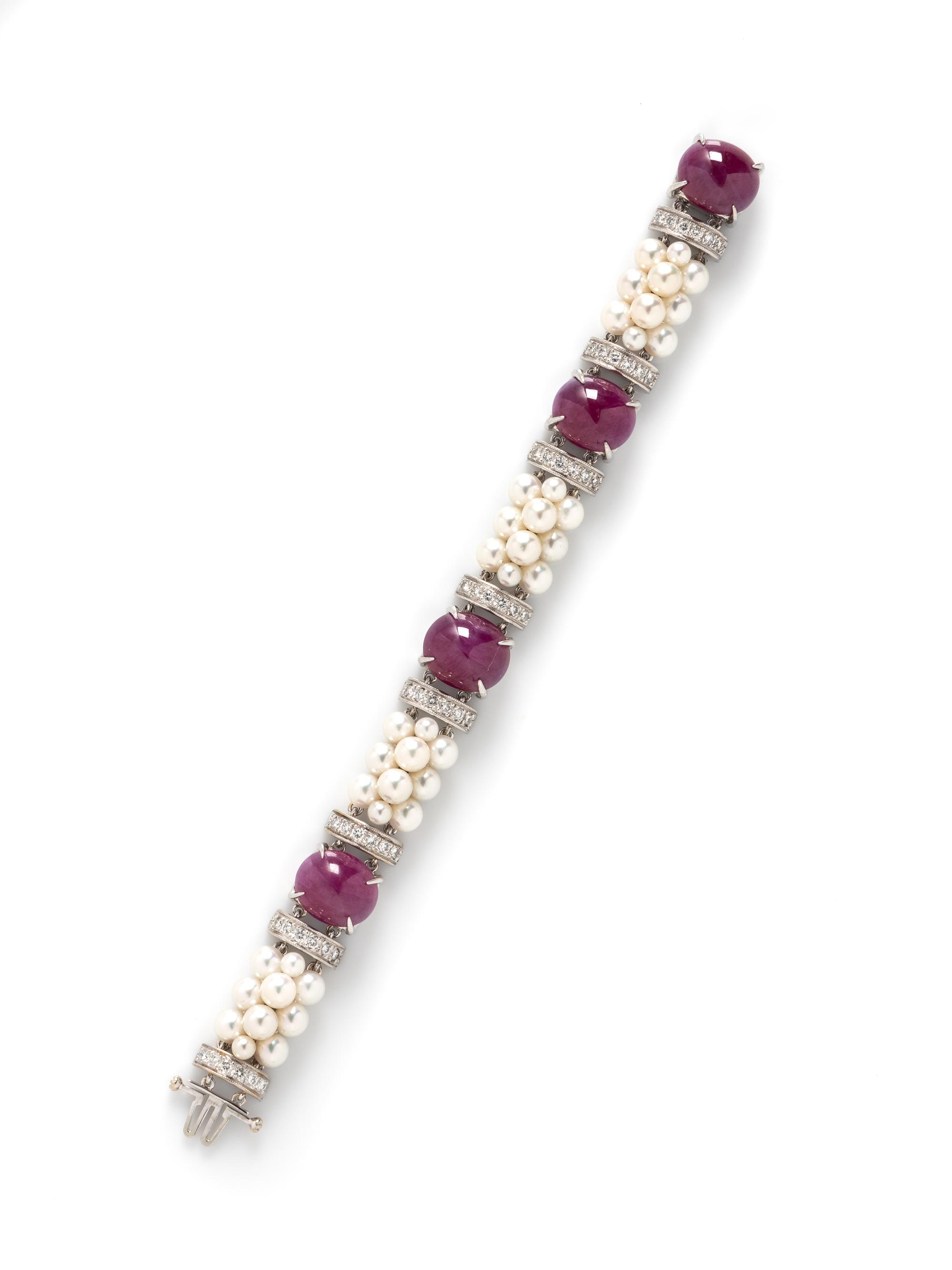 SEAMAN SCHEPPS, RUBY, CULTURED PEARL, AND DIAMOND BRACELET