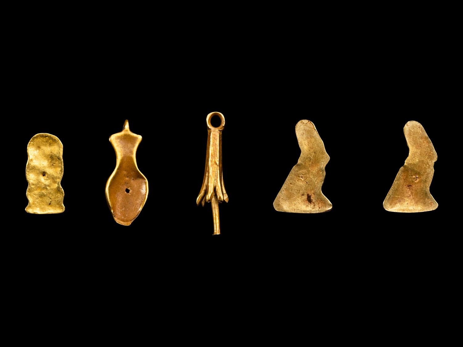 Five Egyptian Gold Amulets including Papyrus, Nefer, Bes and Horus