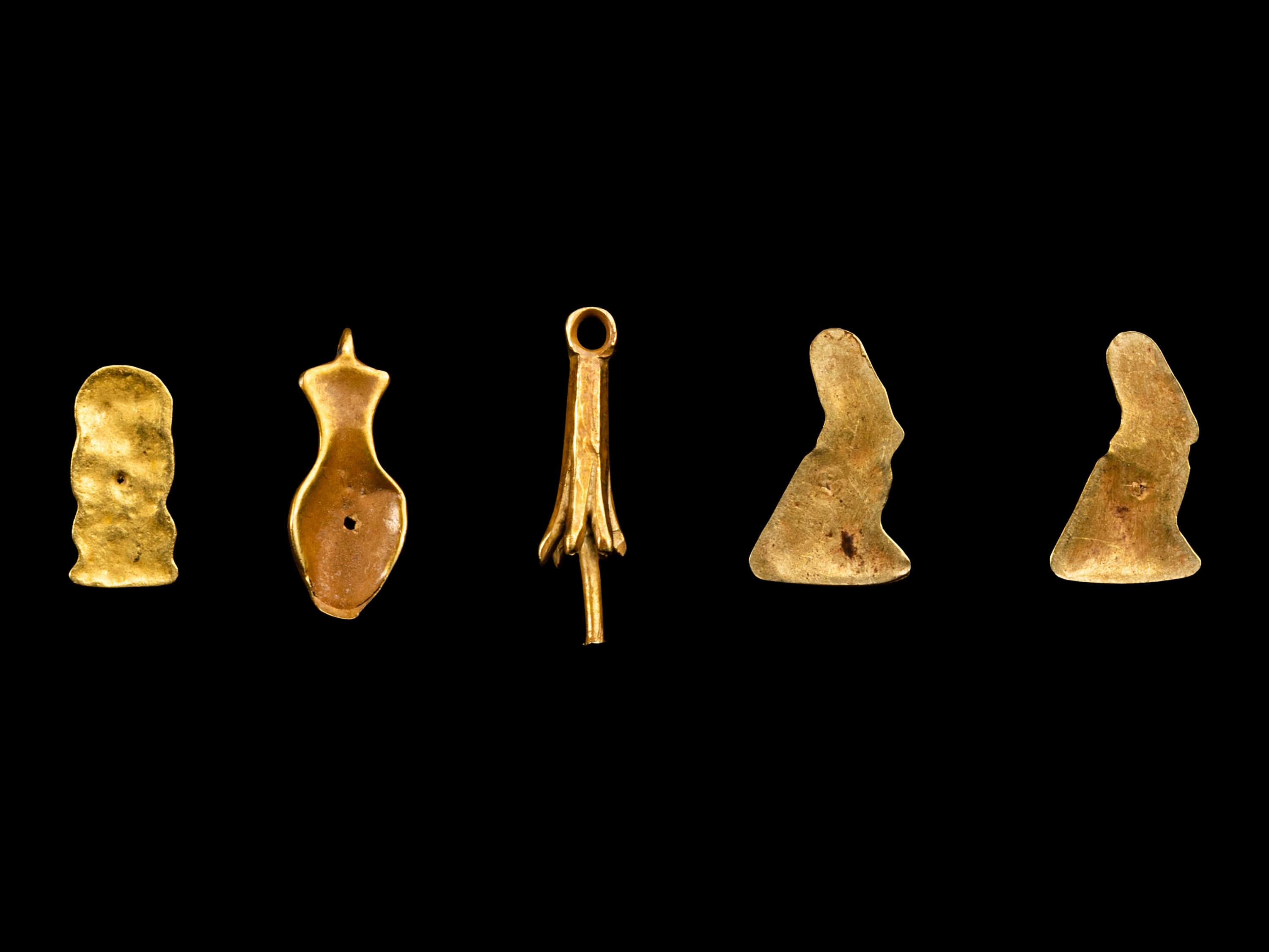 Five Egyptian Gold Amulets including Papyrus, Nefer, Bes and Horus