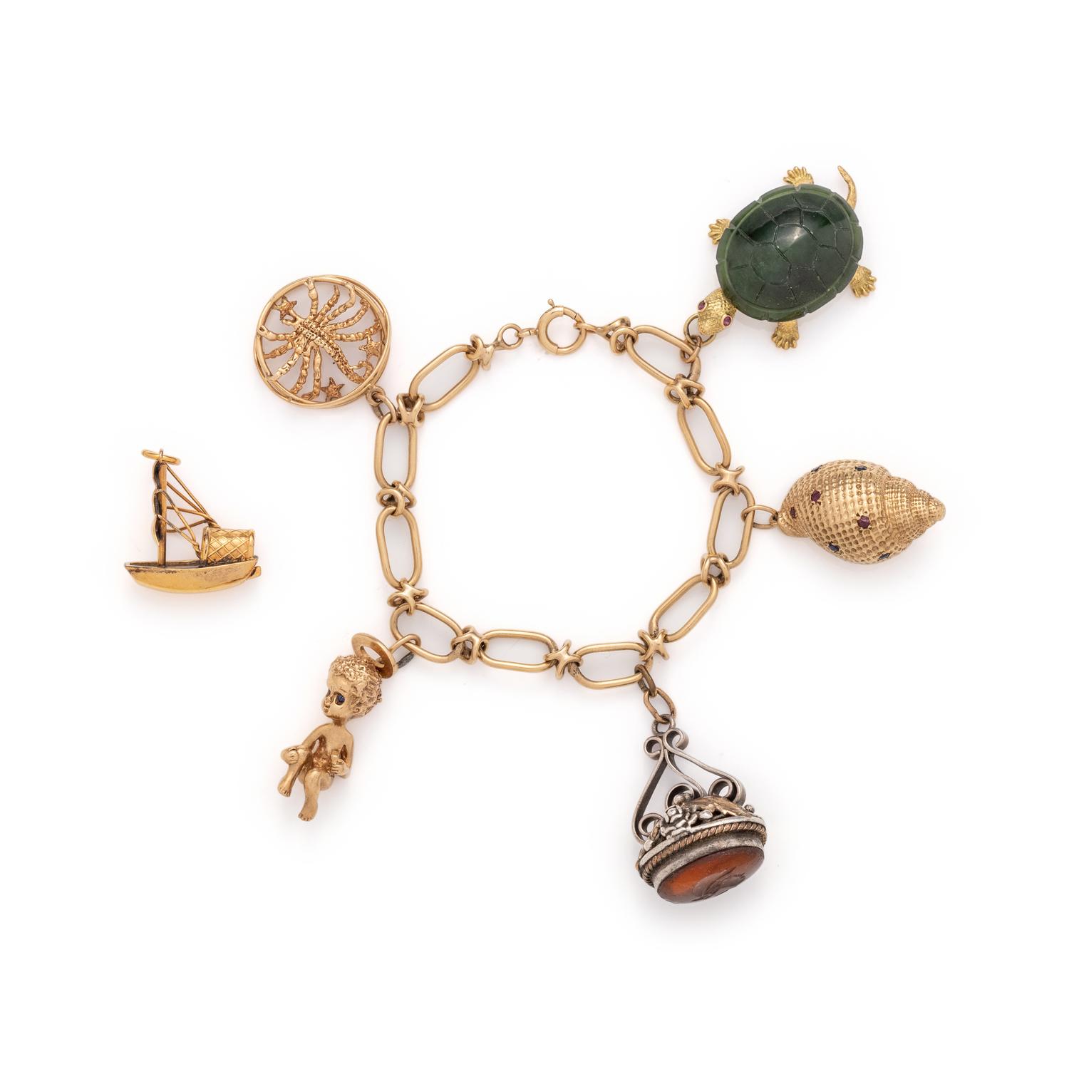 YELLOW GOLD CHARM BRACELET