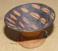 A Neolithic Pottery Vessel Height 3 1/8 x diameter 5 1/2 inches.