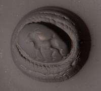 A Roman Gilt-Silver and Garnet Finger Ring with a Ram