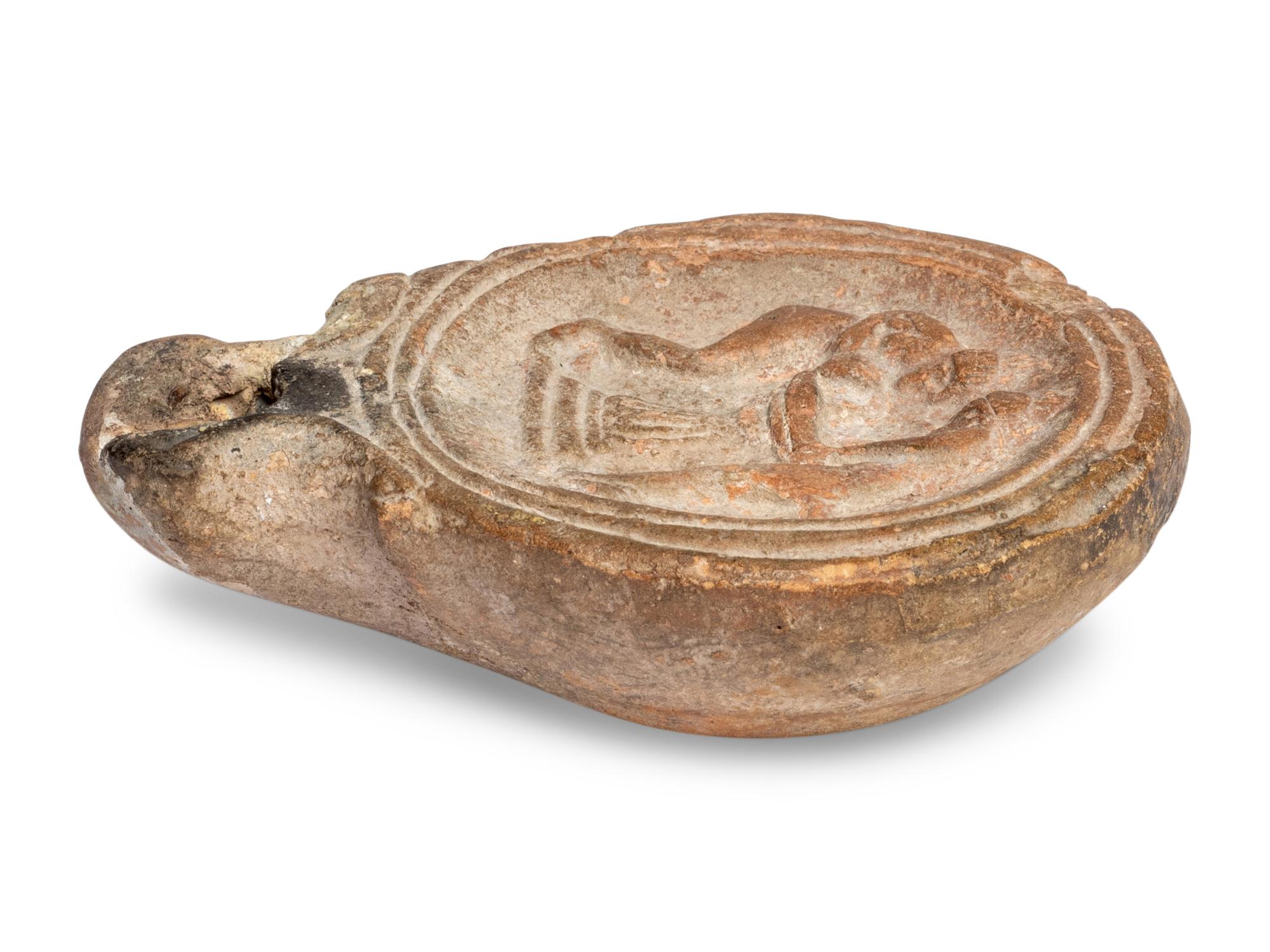 A Roman Terracotta Oil Lamp with Two Women