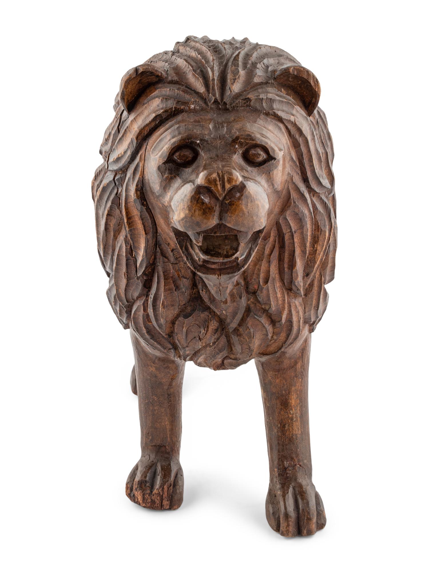 A Continental Carved Wood Lion