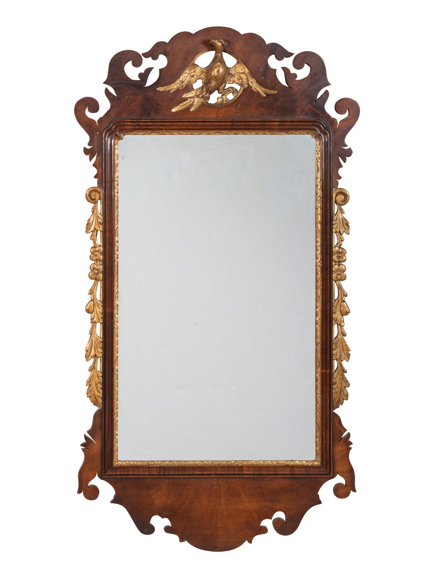 A George III Style Parcel Gilt Mahogany Mirror