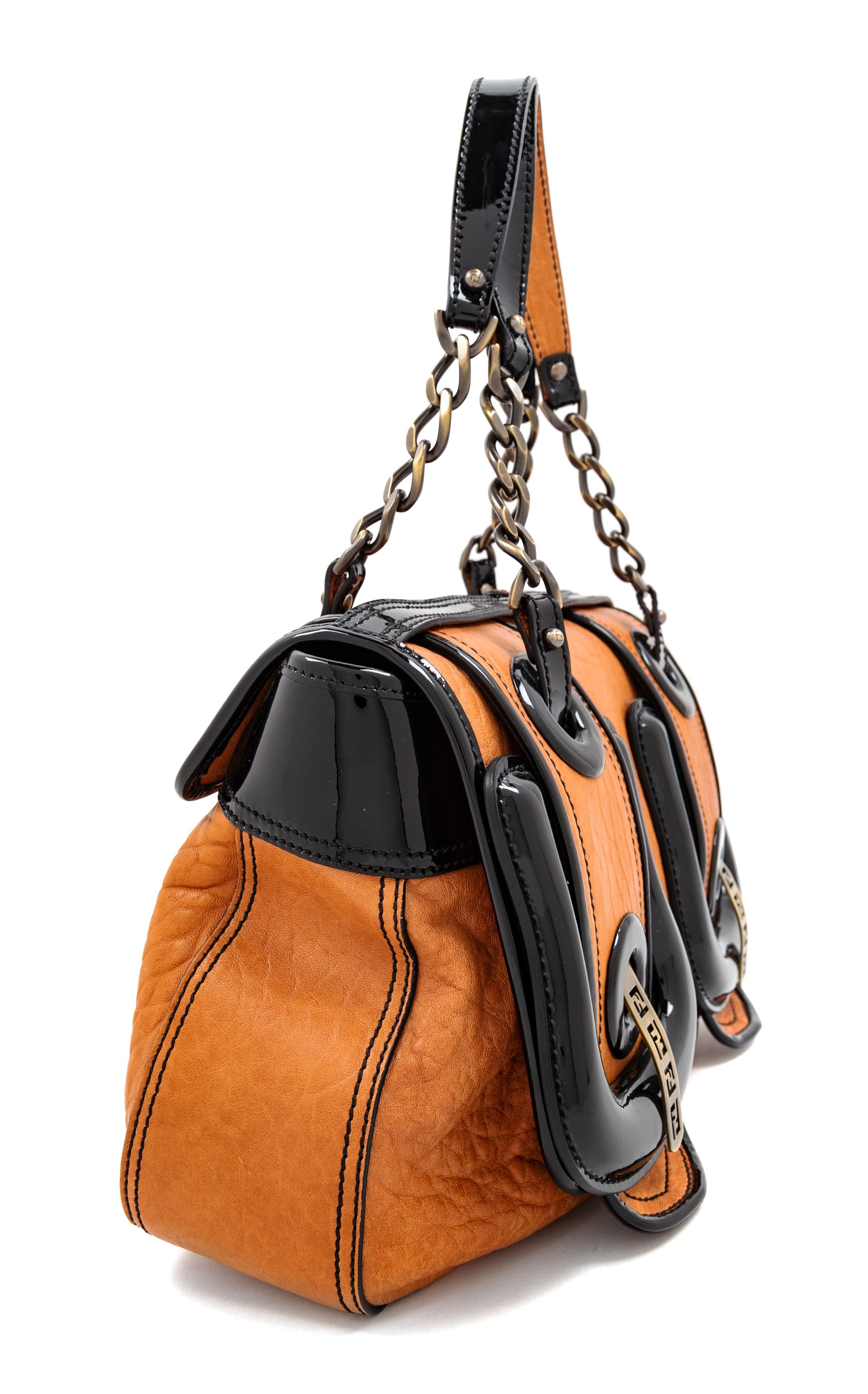 A Fendi Nappa Vernice Patent Leather Satchel, 8" H x 13" W x 4" D; Handle drop: 7".