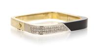 A 14 Karat Yellow Gold, Onyx and Diamond Bangle Bracelet, 29.50 dwts.