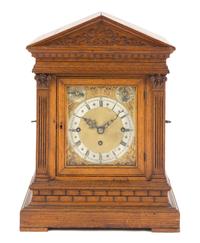 A German Oak Musical Mantel Clock Height 17 7/8 inches. — WINTERHALDER & HOFMEIER, MID-19TH CENTURY
