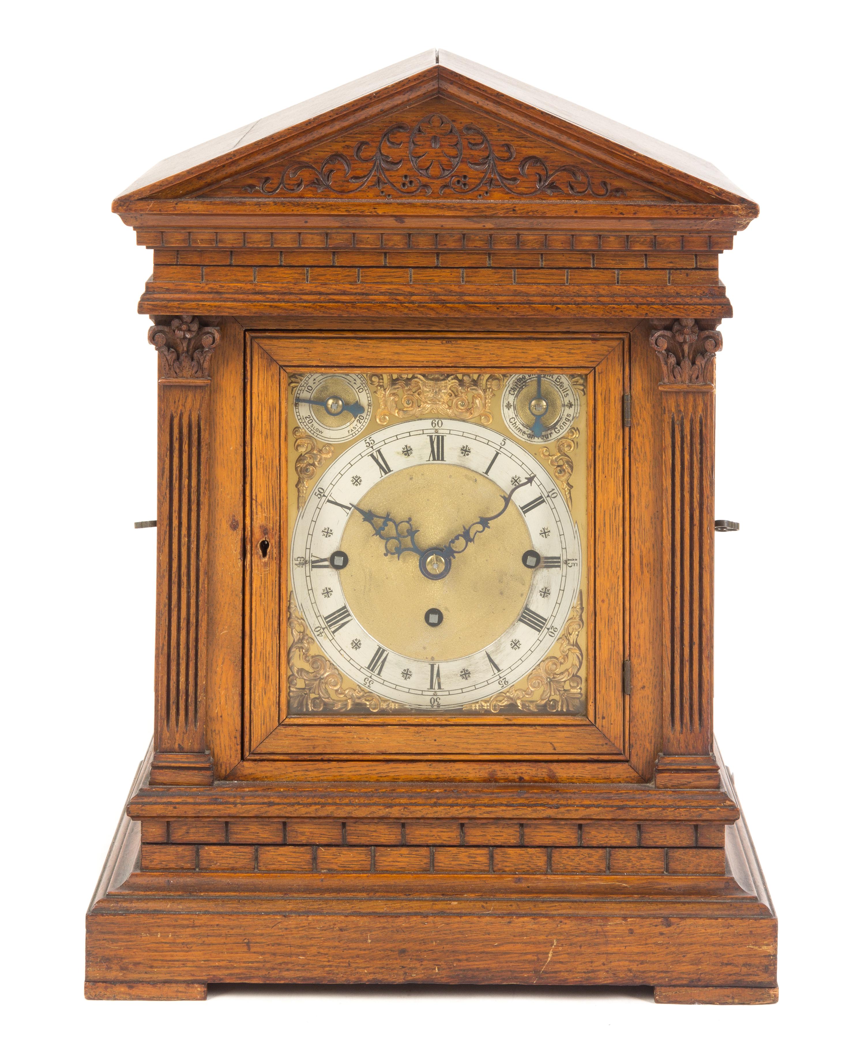 A German Oak Musical Mantel Clock Height 17 7/8 inches. — WINTERHALDER & HOFMEIER, MID-19TH CENTURY