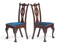 A Pair of Chippendale Carved Walnut Side Chairs