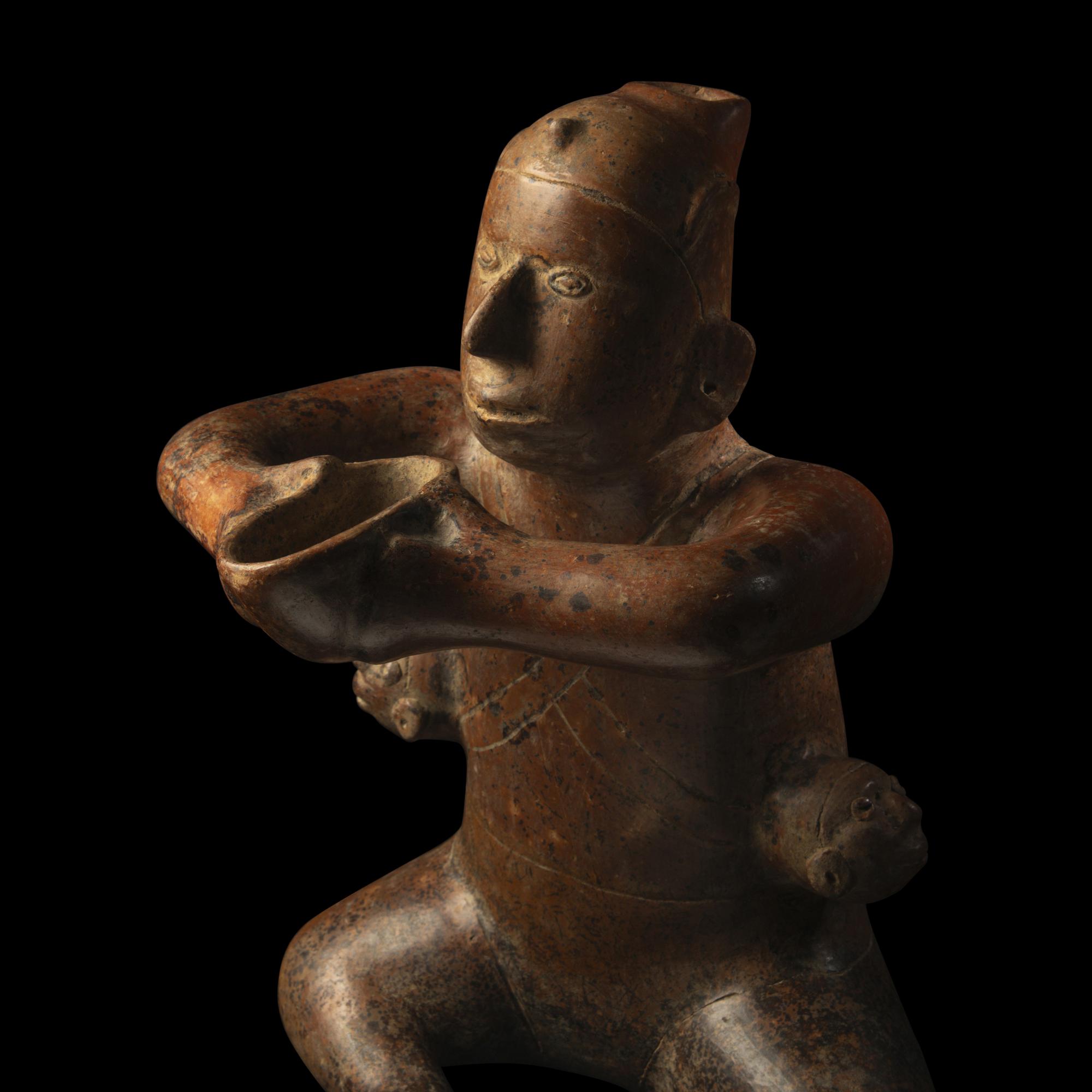 A Colima Terracotta Seated Figure