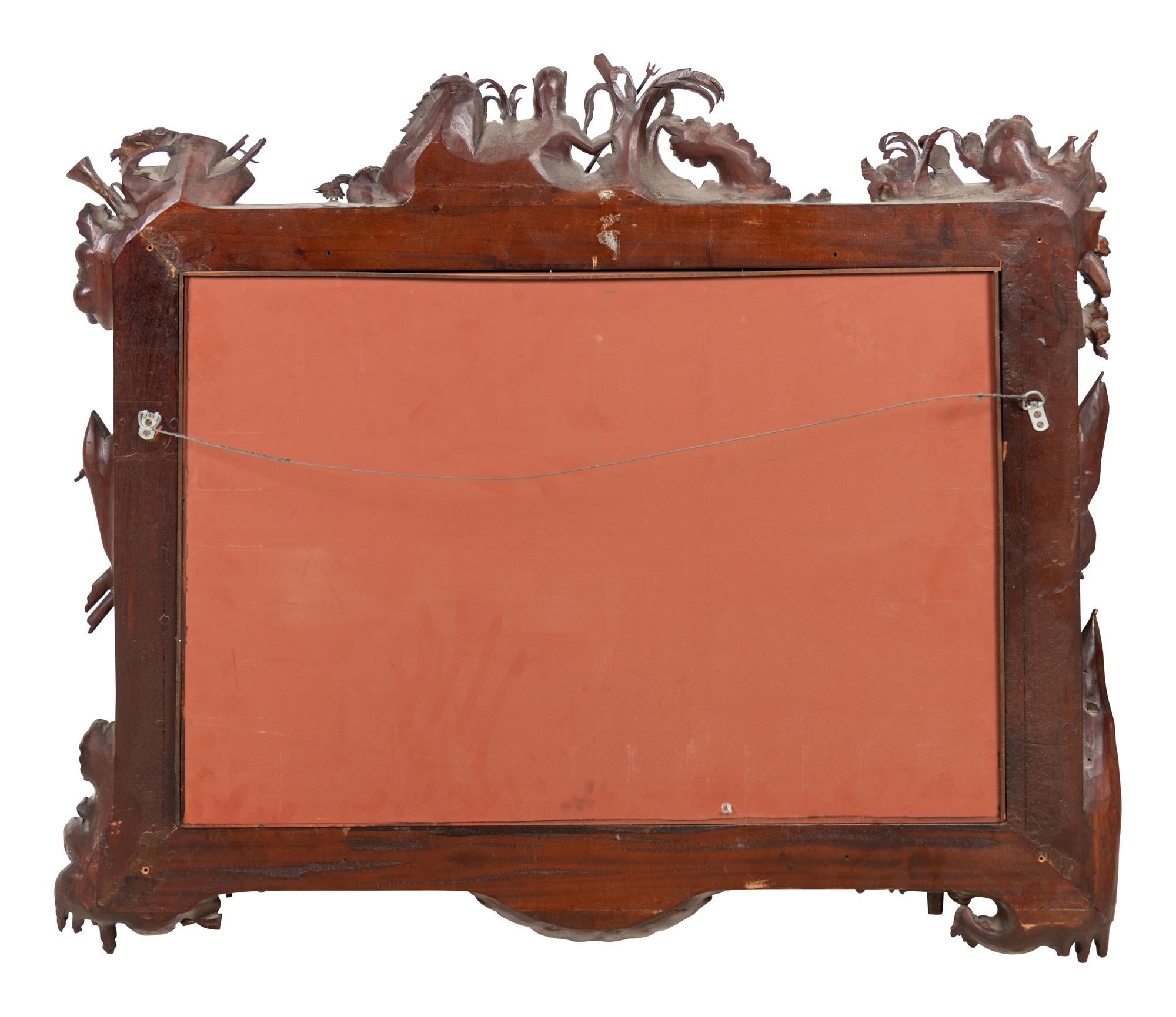 A Continental Carved Mahogany Mirror of Naval Interest
