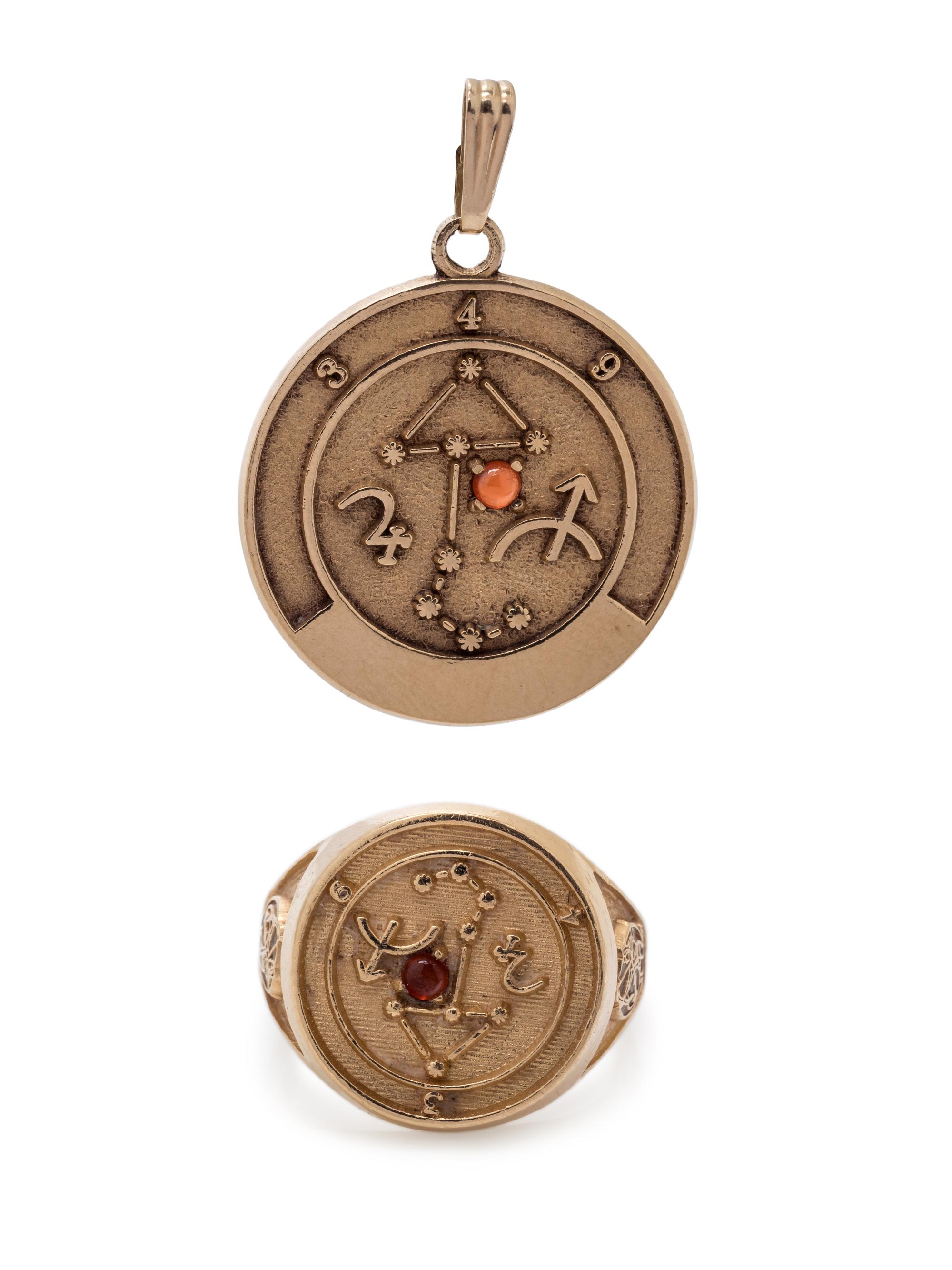 COLLECTION OF YELLOW GOLD ZODIAC JEWELRY
