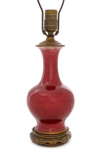 A Chinese Sang-de-Boeuf Glazed Porcelain Vase Height of vase 9 inches. — 18TH/19TH CENTURY