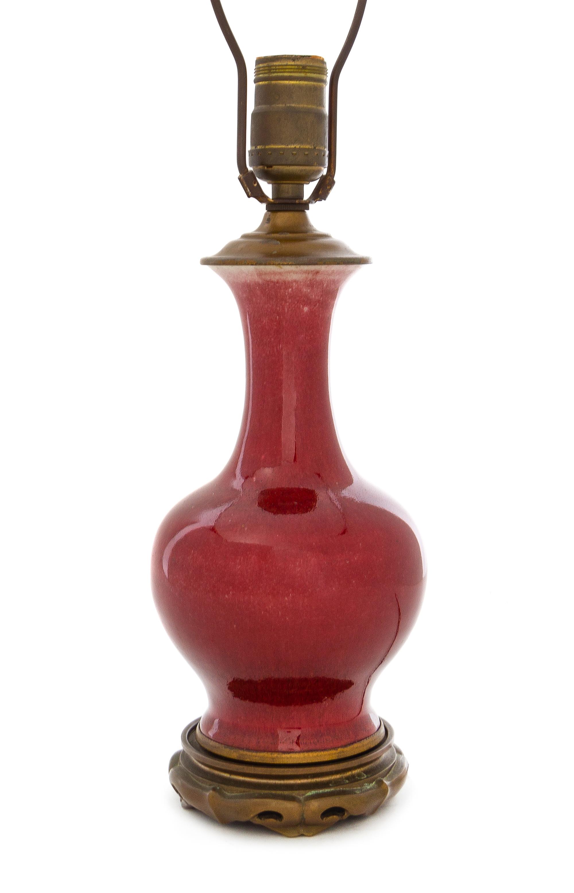 A Chinese Sang-de-Boeuf Glazed Porcelain Vase Height of vase 9 inches. — 18TH/19TH CENTURY