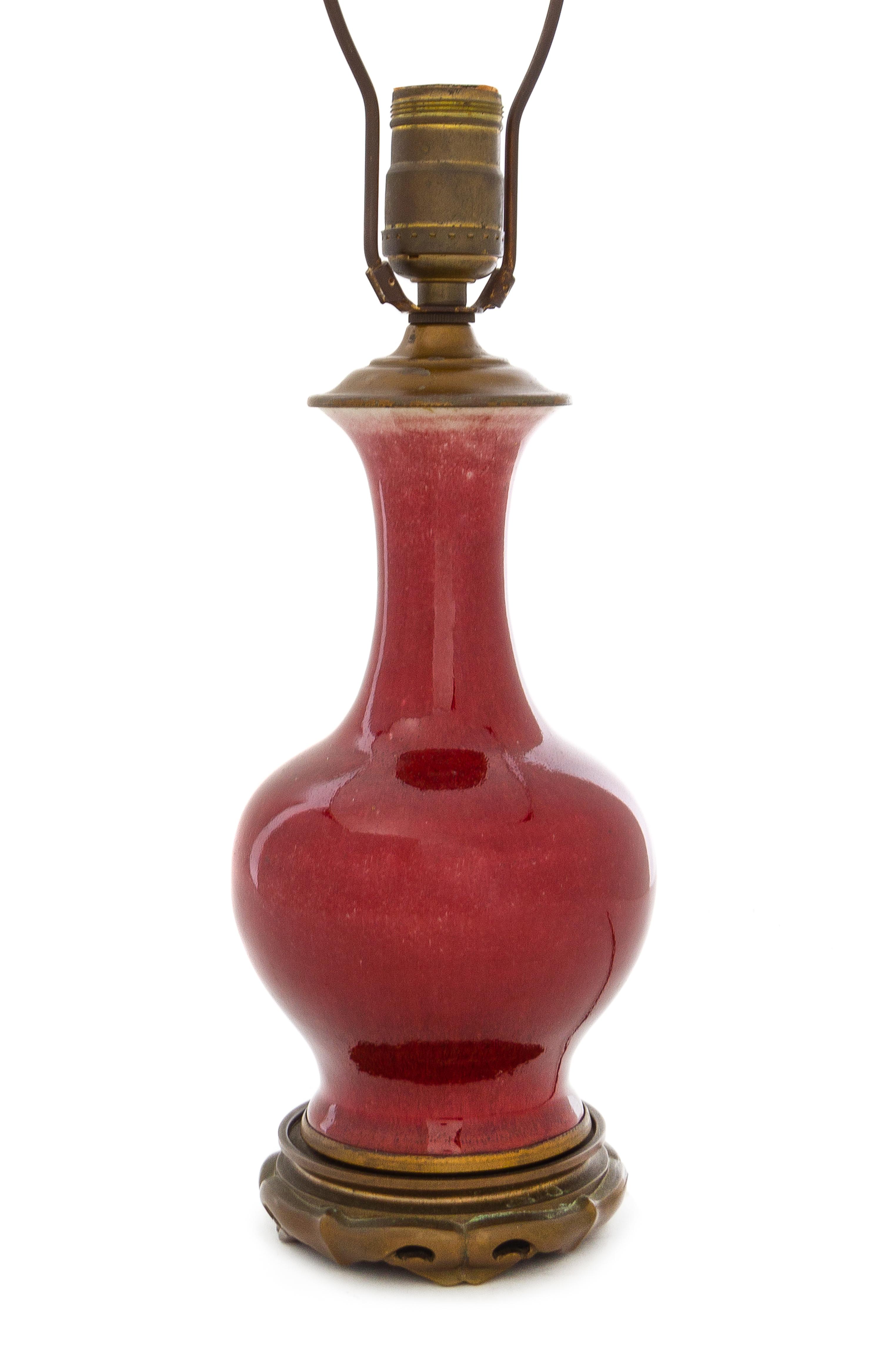 A Chinese Sang-de-Boeuf Glazed Porcelain Vase Height of vase 9 inches. — 18TH/19TH CENTURY