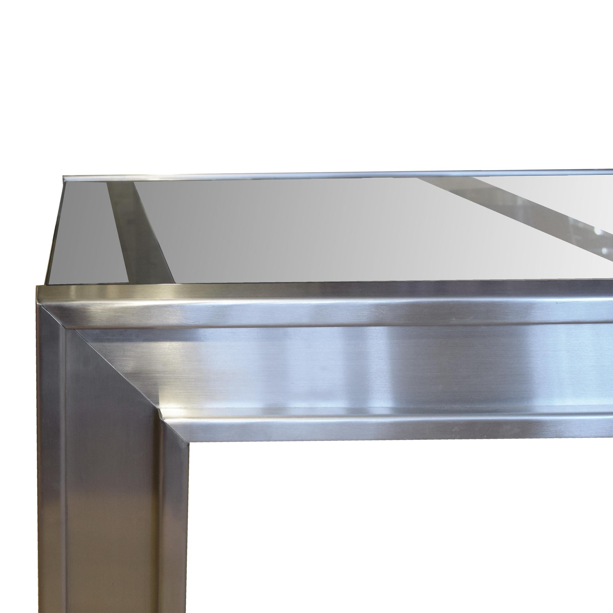 A Mid Century Polished Steel and Glass Table 96" W x 32" D x 30.5" H — United States, Mid-20th Century