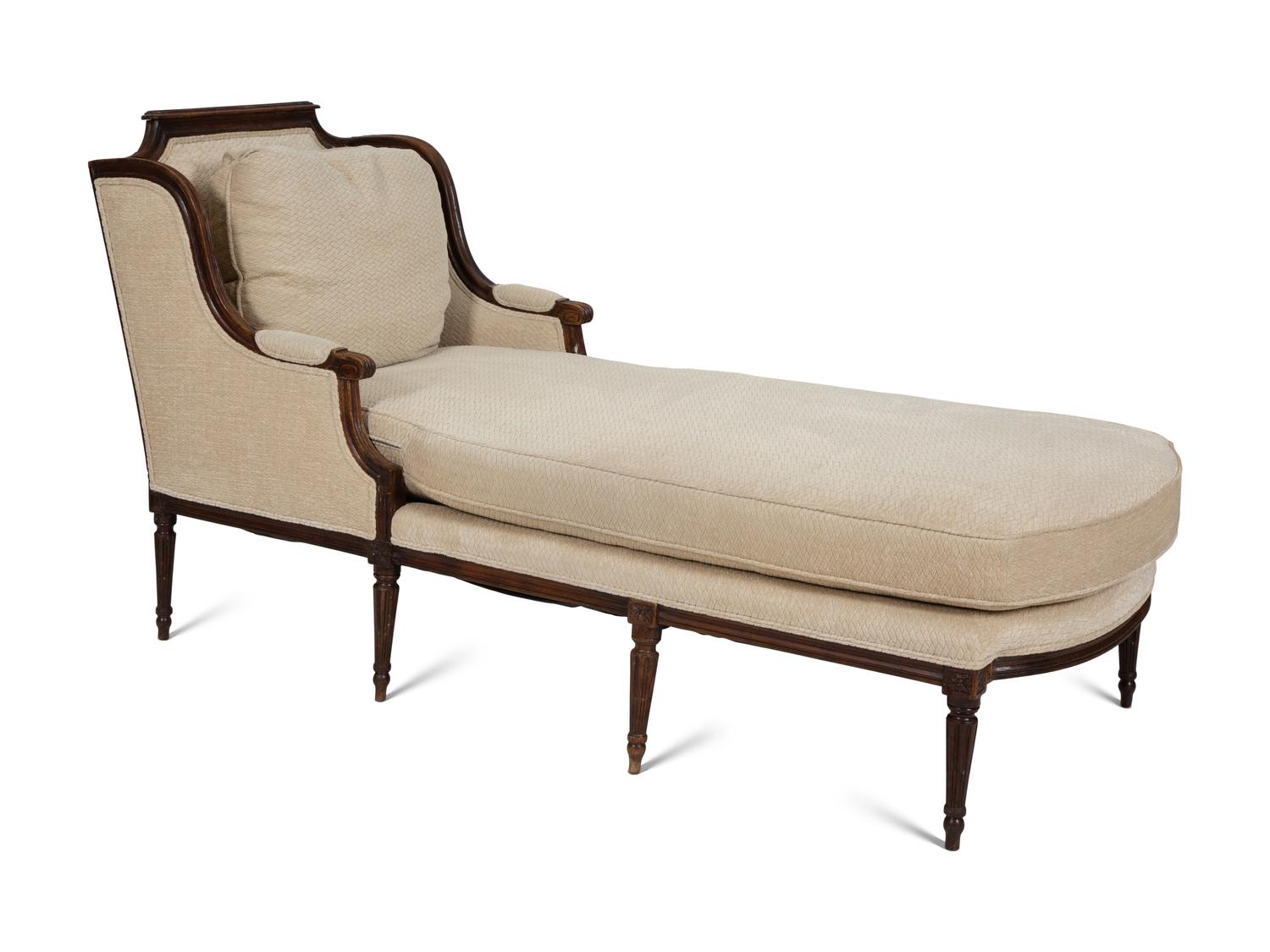 A Louis XVI Carved Walnut Chaise Longue