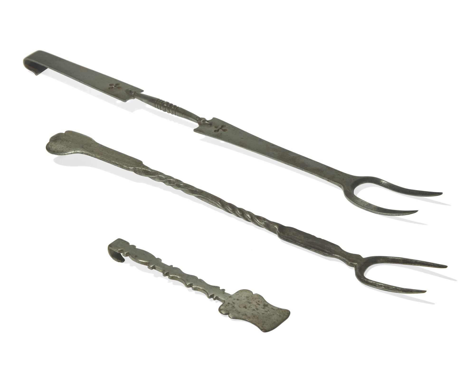 A Group of Three Steel or Wrought Iron Kitchen Implements