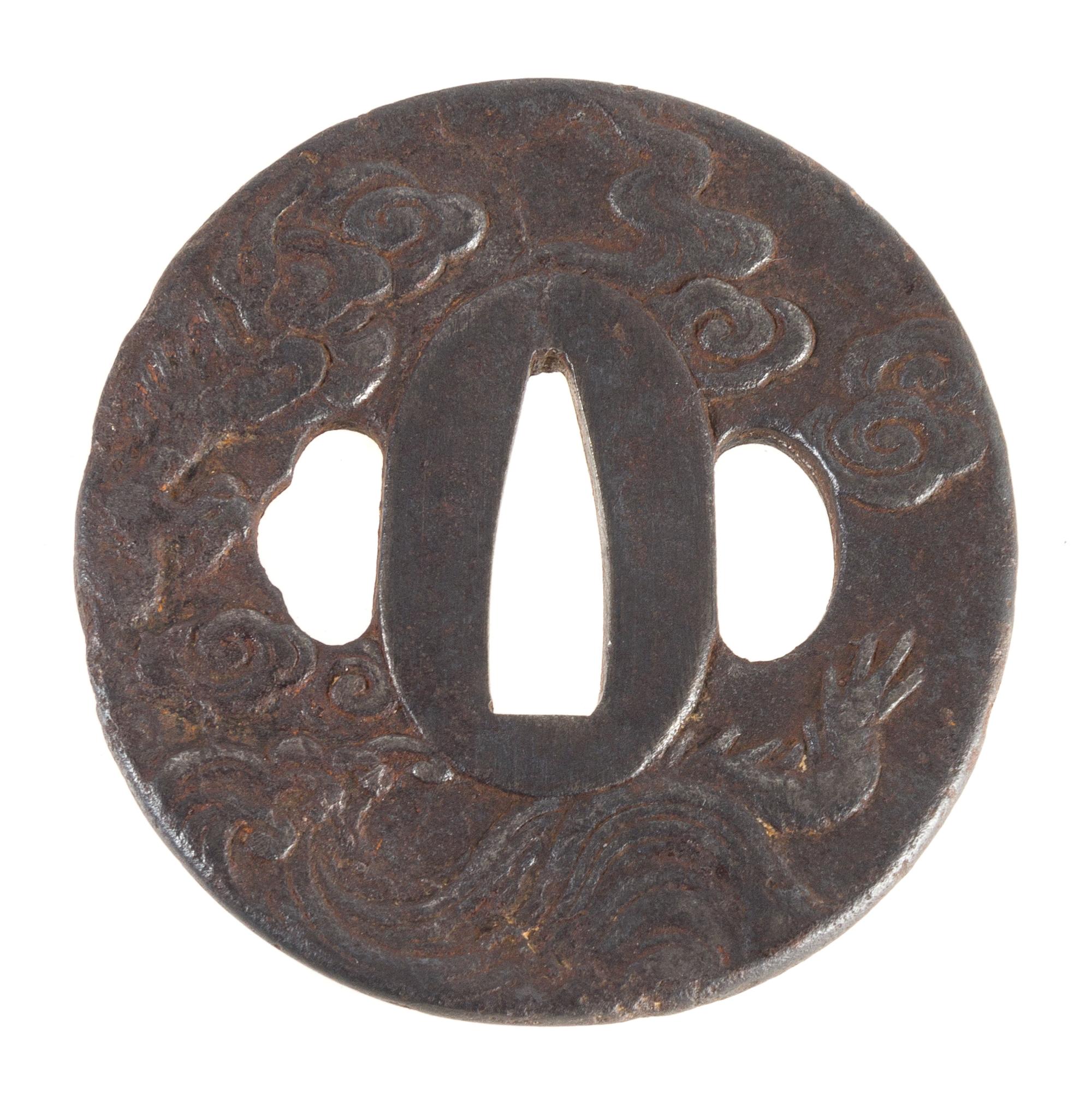 An Iron Tsuba Height 2 3/4 inches. — EARLY 18TH CENTURY