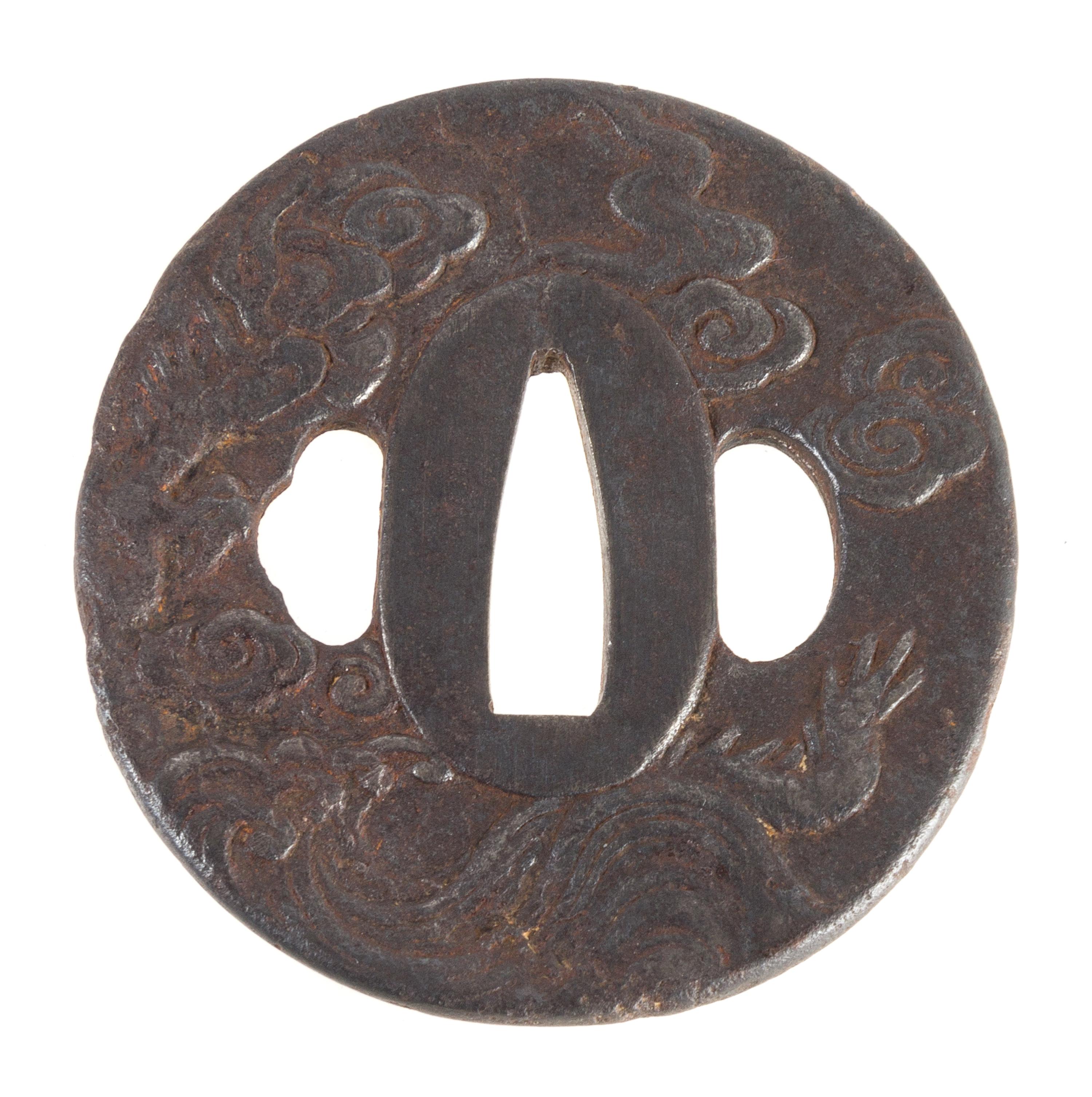 An Iron Tsuba Height 2 3/4 inches. — EARLY 18TH CENTURY