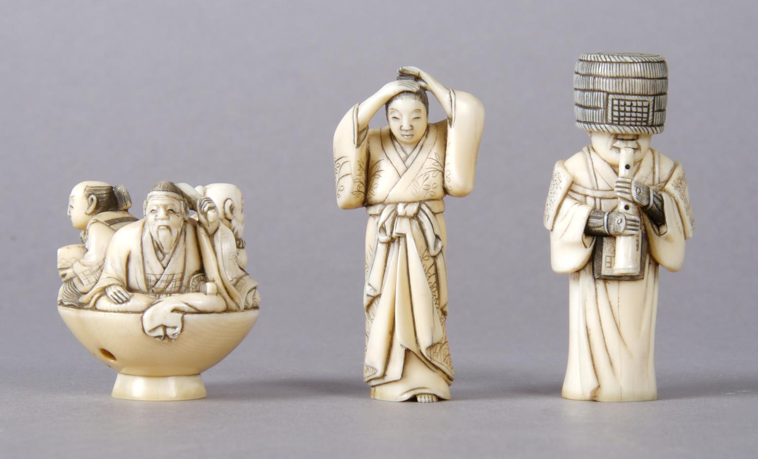 A Group of Three Ivory Netsuke, Height of tallest 2 inches.