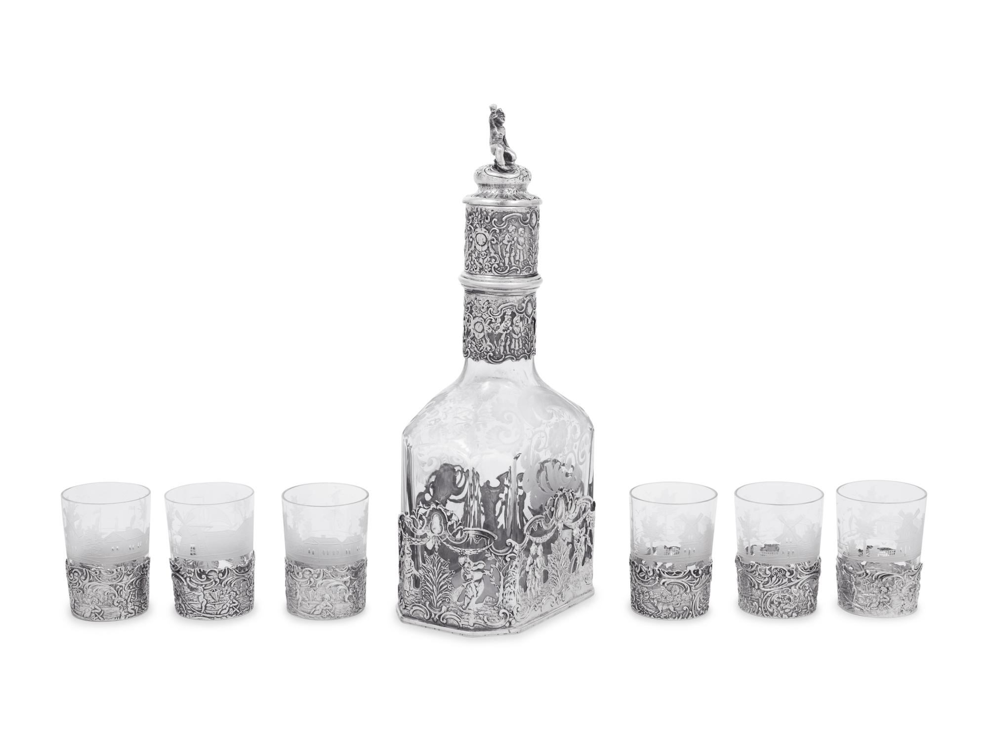 A Continental Silver Mounted Etched Glass Drink Service