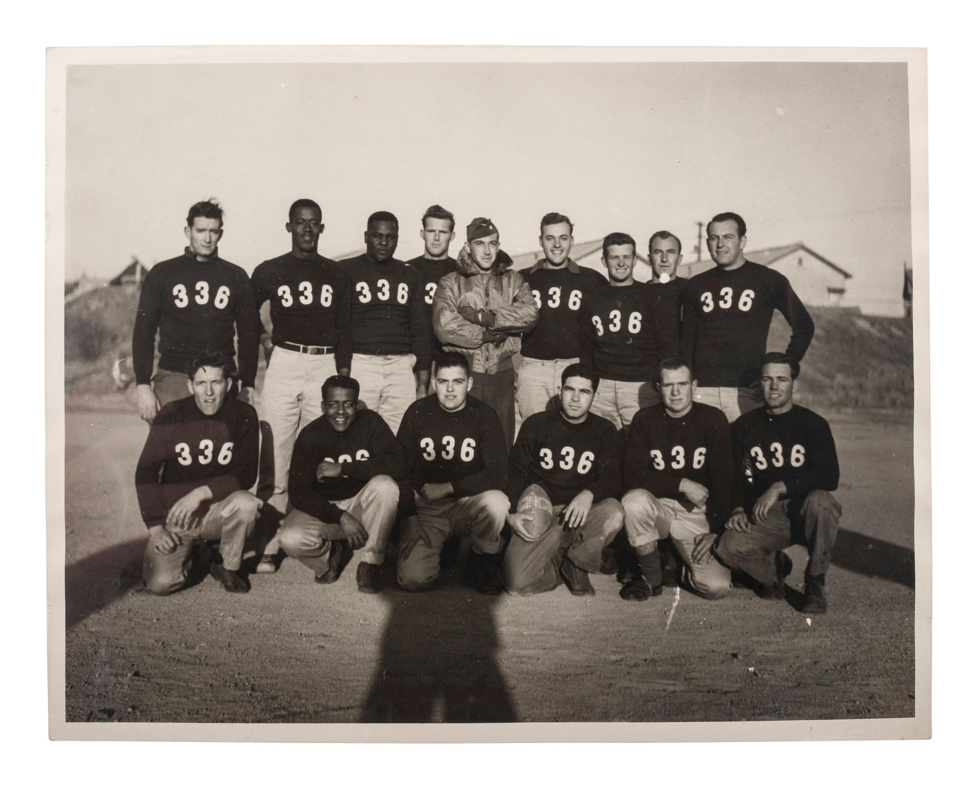 [WORLD WAR II & VIETNAM]. A group of 14 snapshots including portraits of prize fighter Toikey Thompson and black female combat nurses, including: