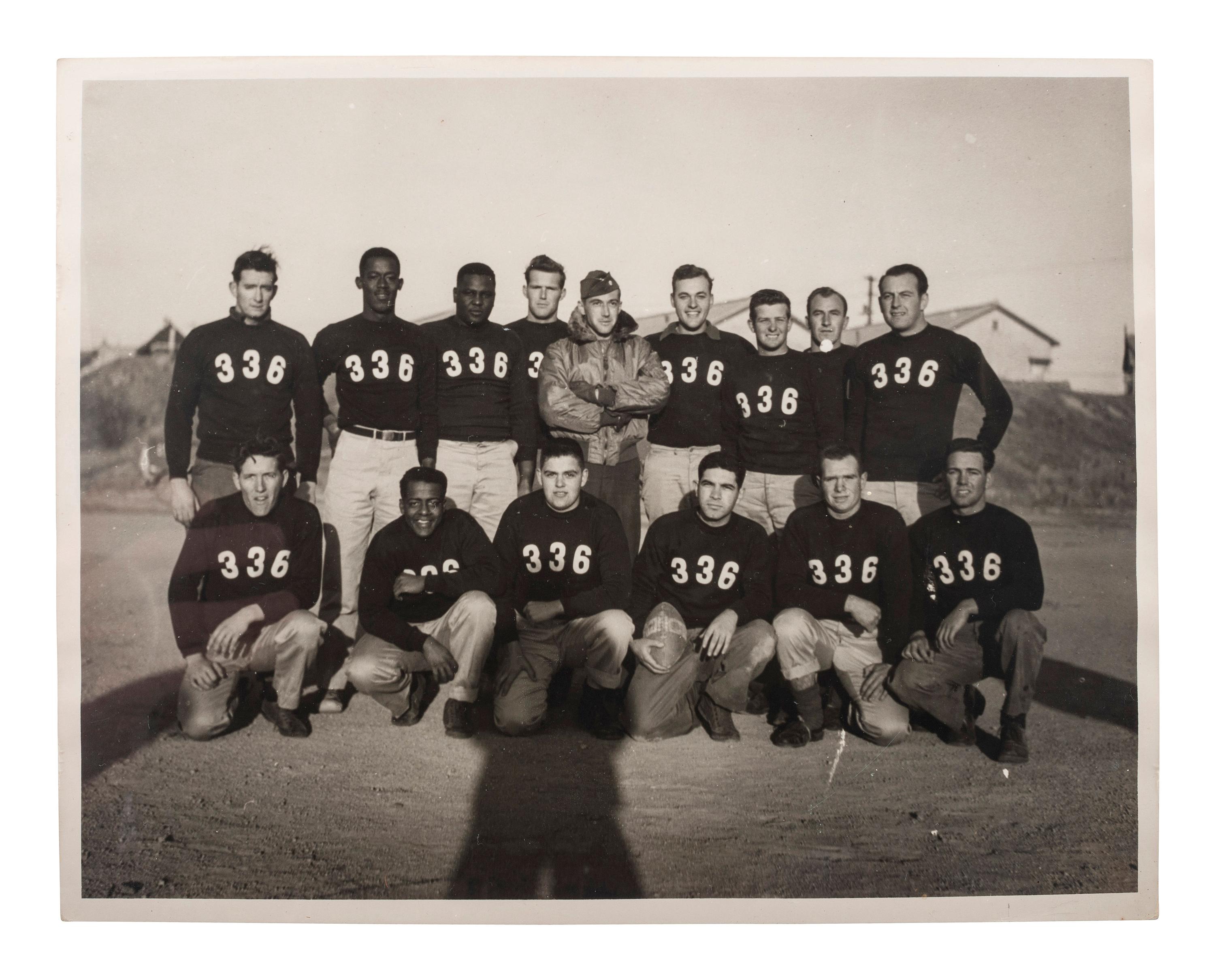 [WORLD WAR II & VIETNAM]. A group of 14 snapshots including portraits of prize fighter Toikey Thompson and black female combat nurses, including:
