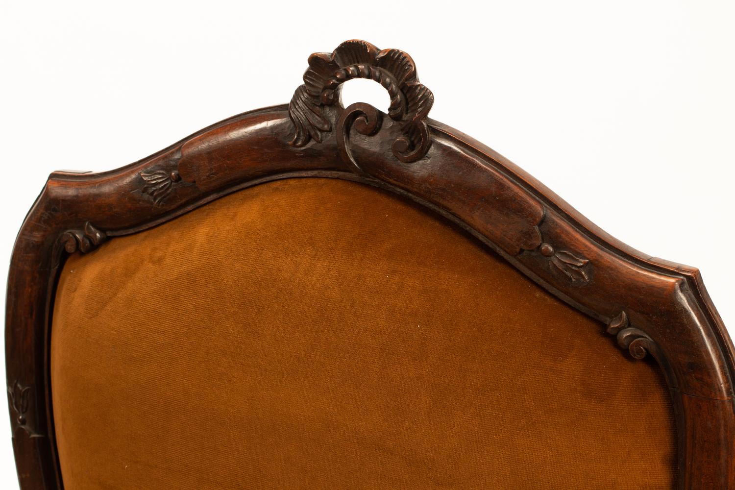 A Pair of Venetian Carved Walnut Armchairs
