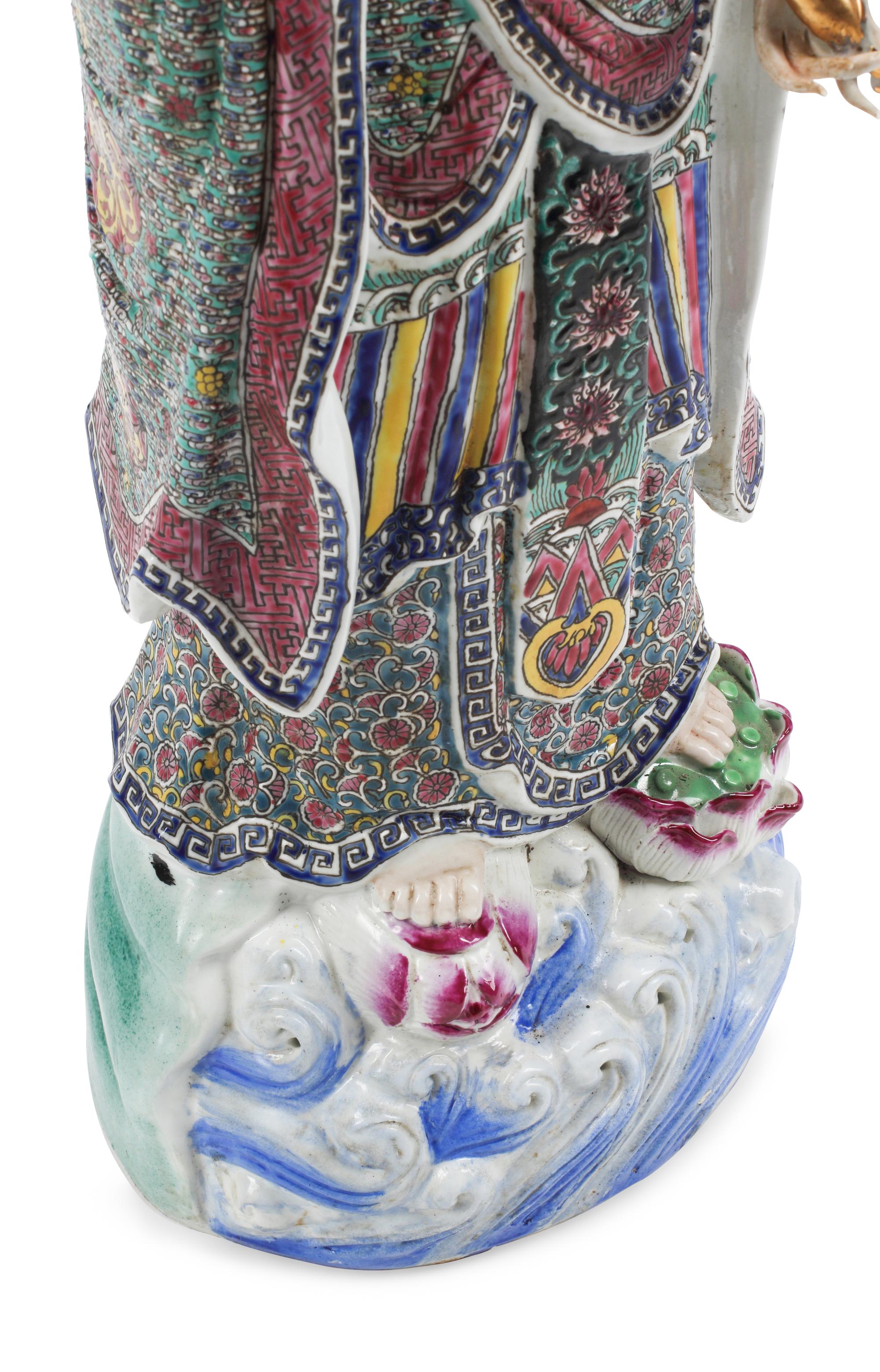 A Chinese Enameled Porcelain Figure of Guanyin