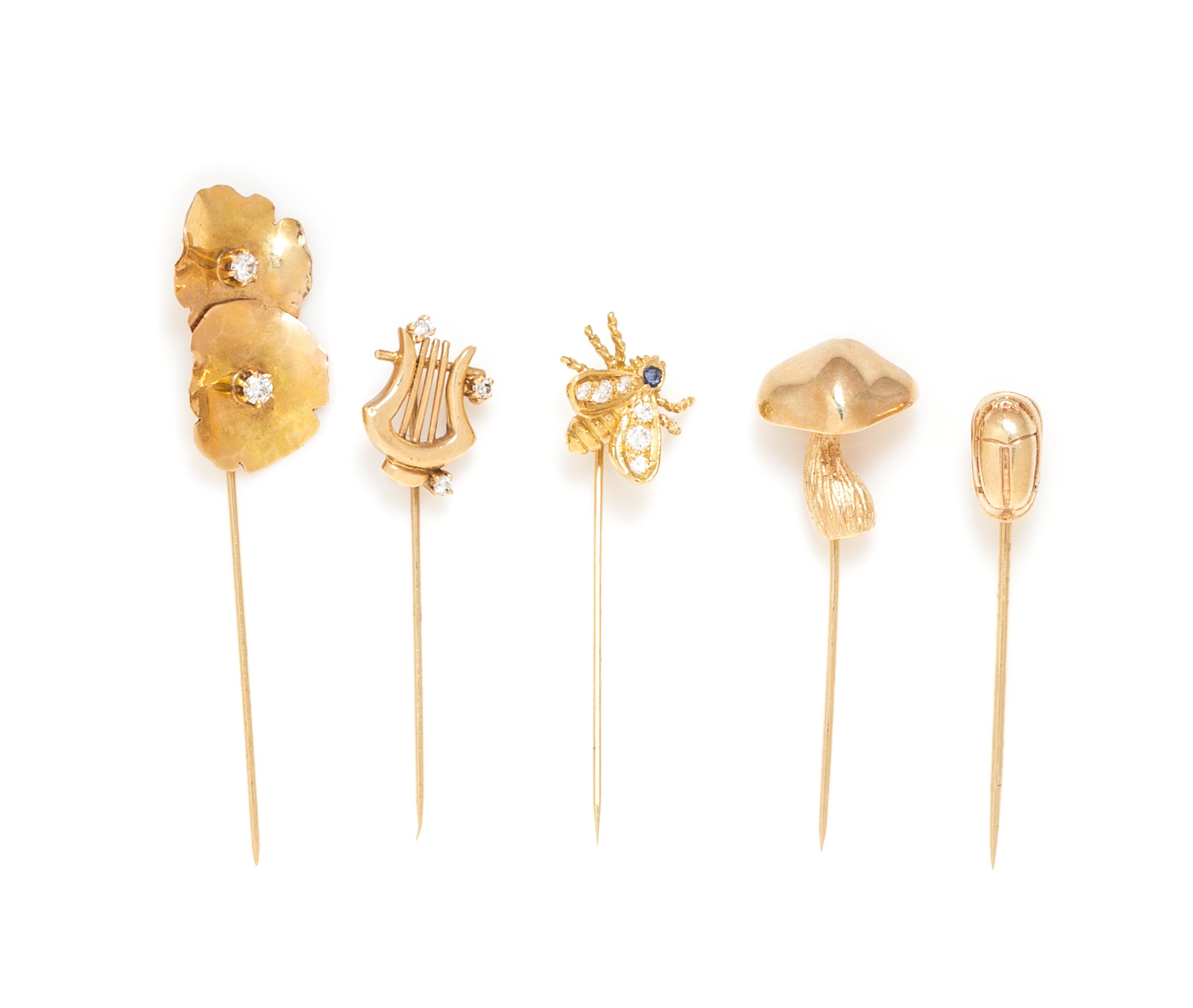 A Collection of Yellow Gold Stickpins, 11.80 dwts.